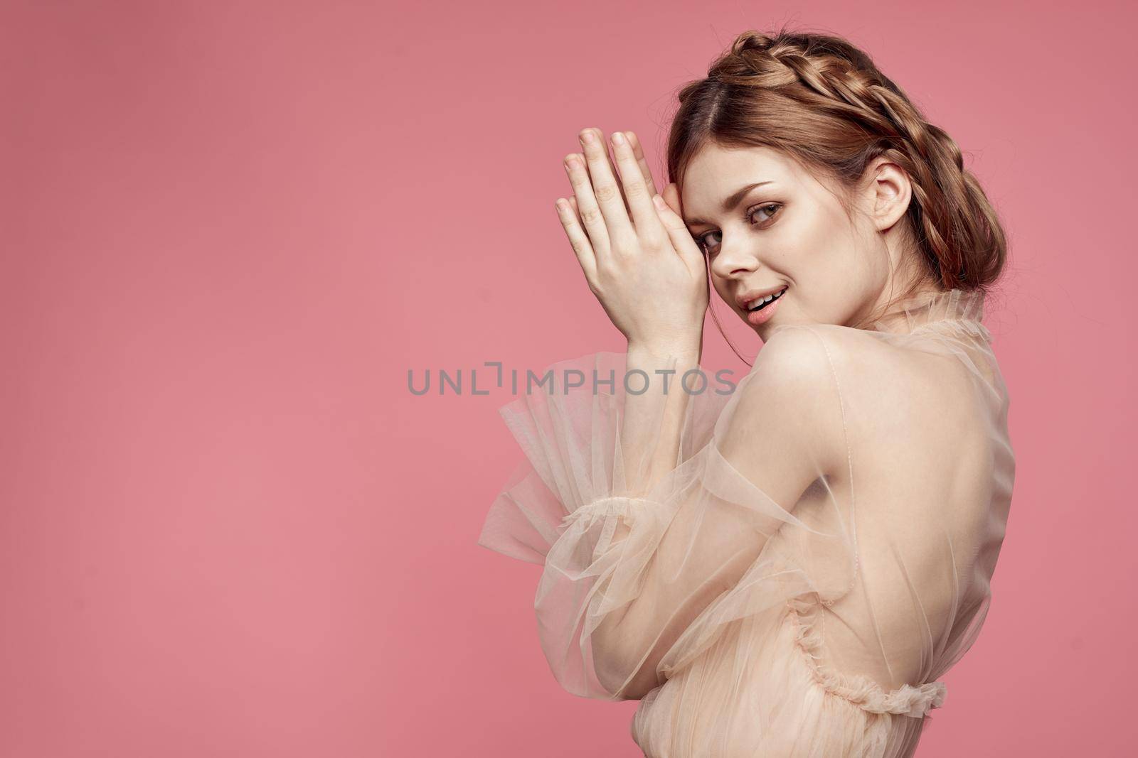 cheerful woman attractive look lifestyle romance pink background. High quality photo