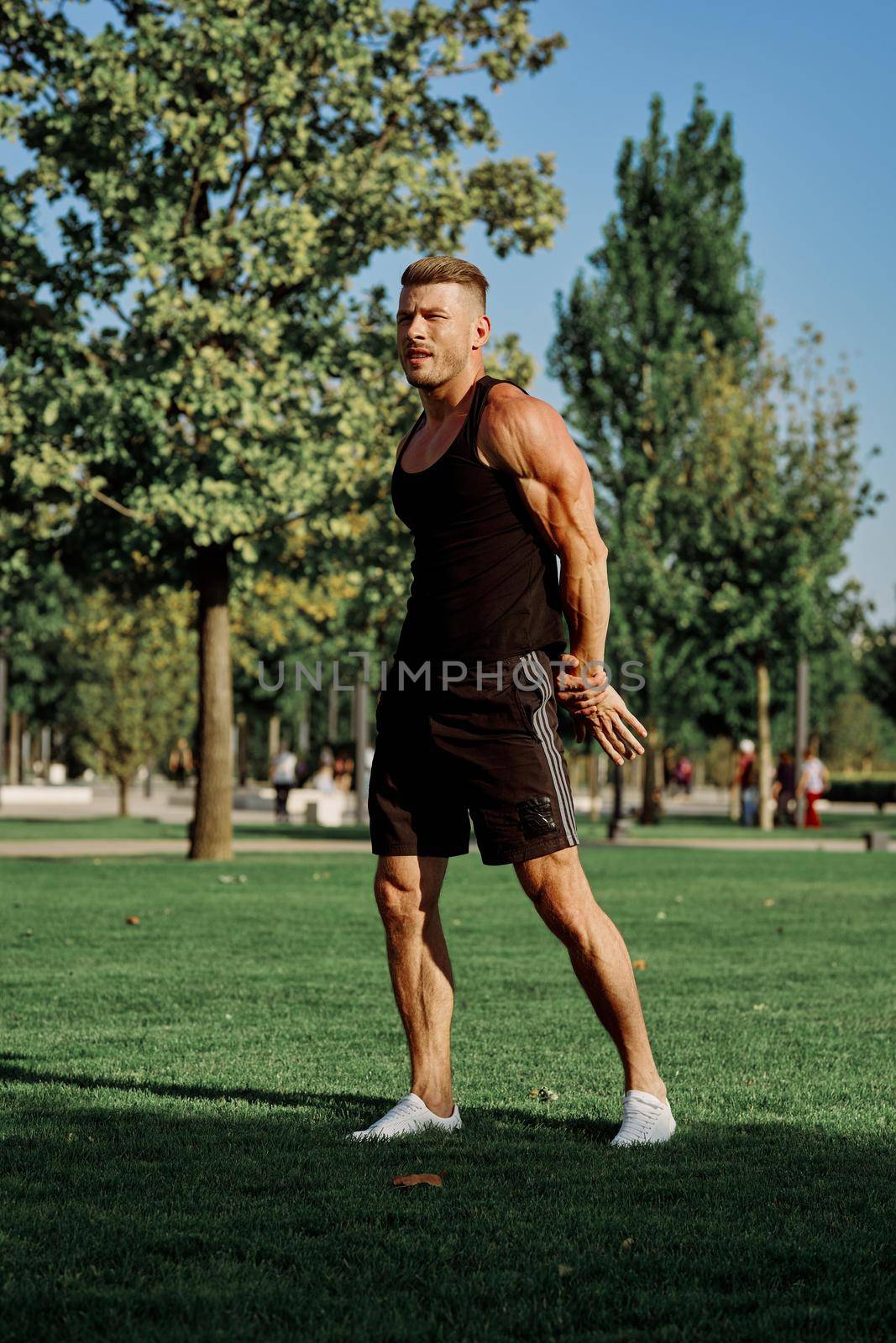 sports man in the park exercise fitness cardio by Vichizh
