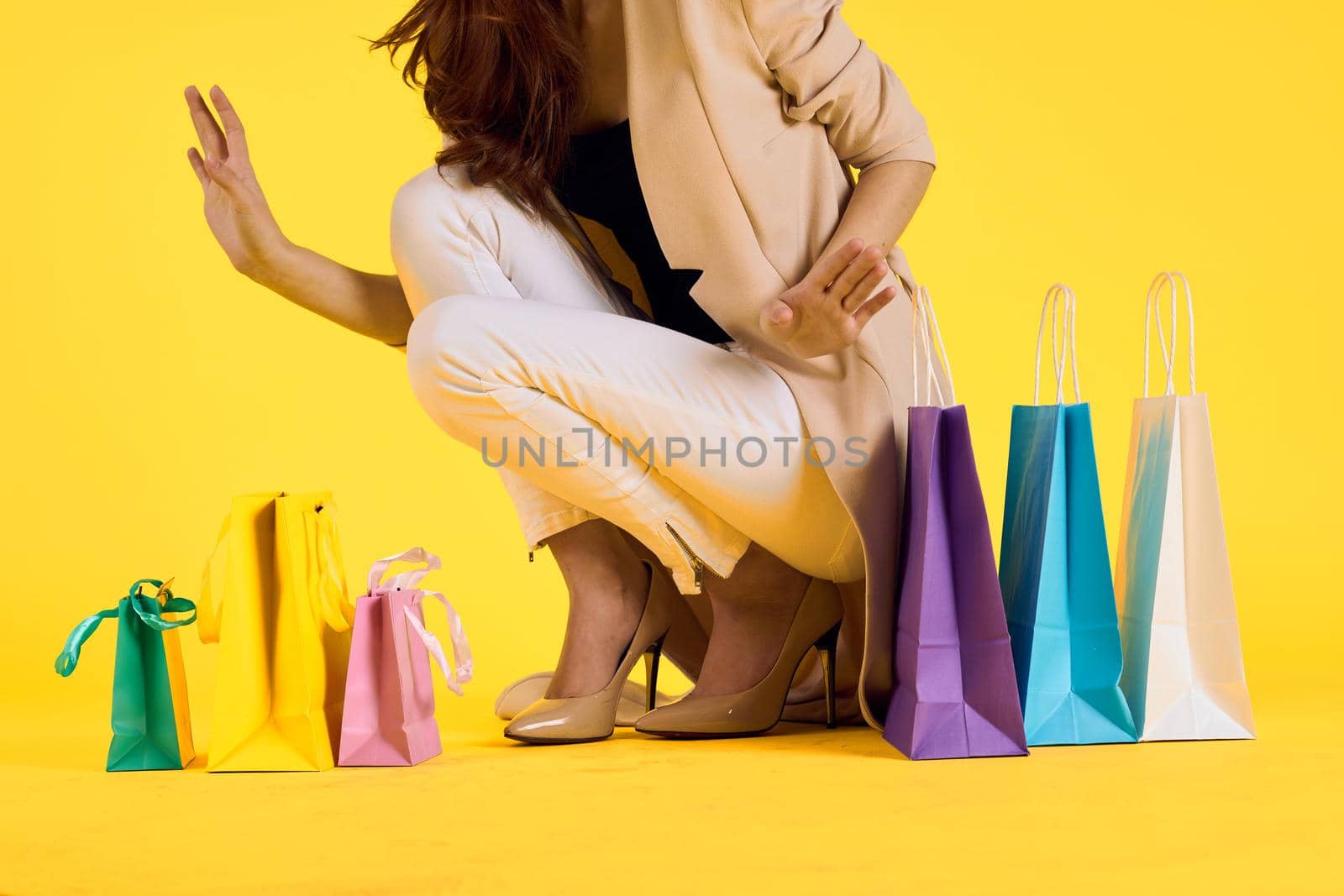 glamorous woman multicolored packs emotions shopping fashion isolated background. High quality photo