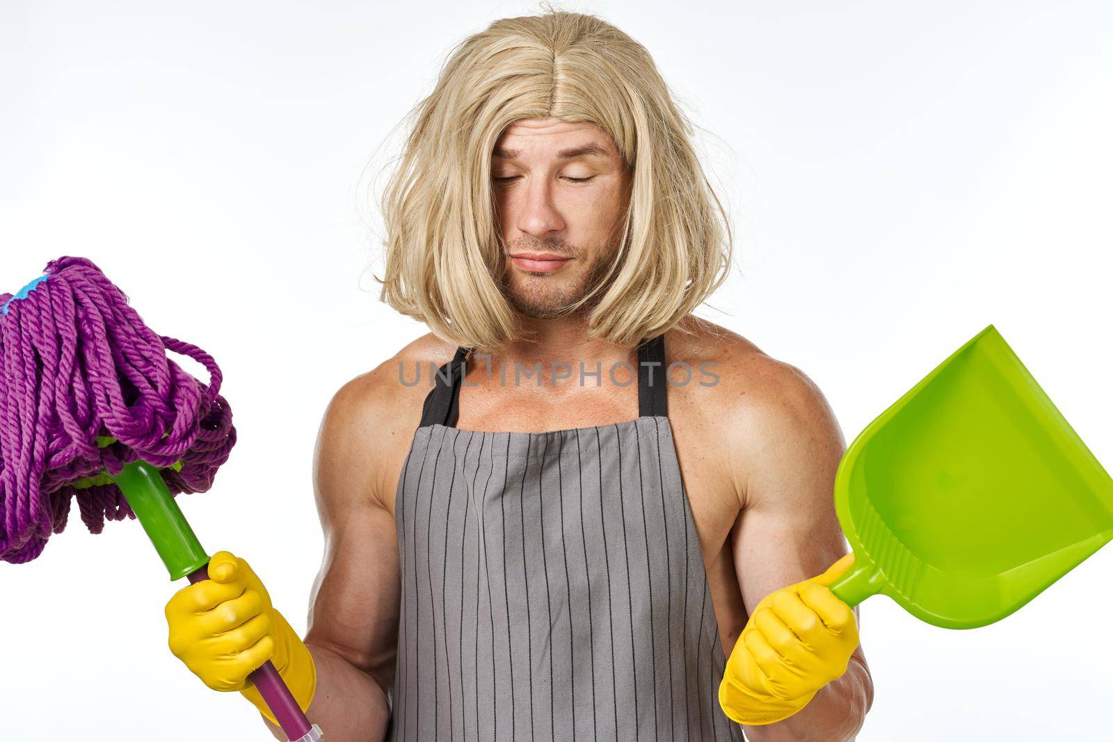 Muscled Man in Womens Wig Mop Cleaning Housework. High quality photo