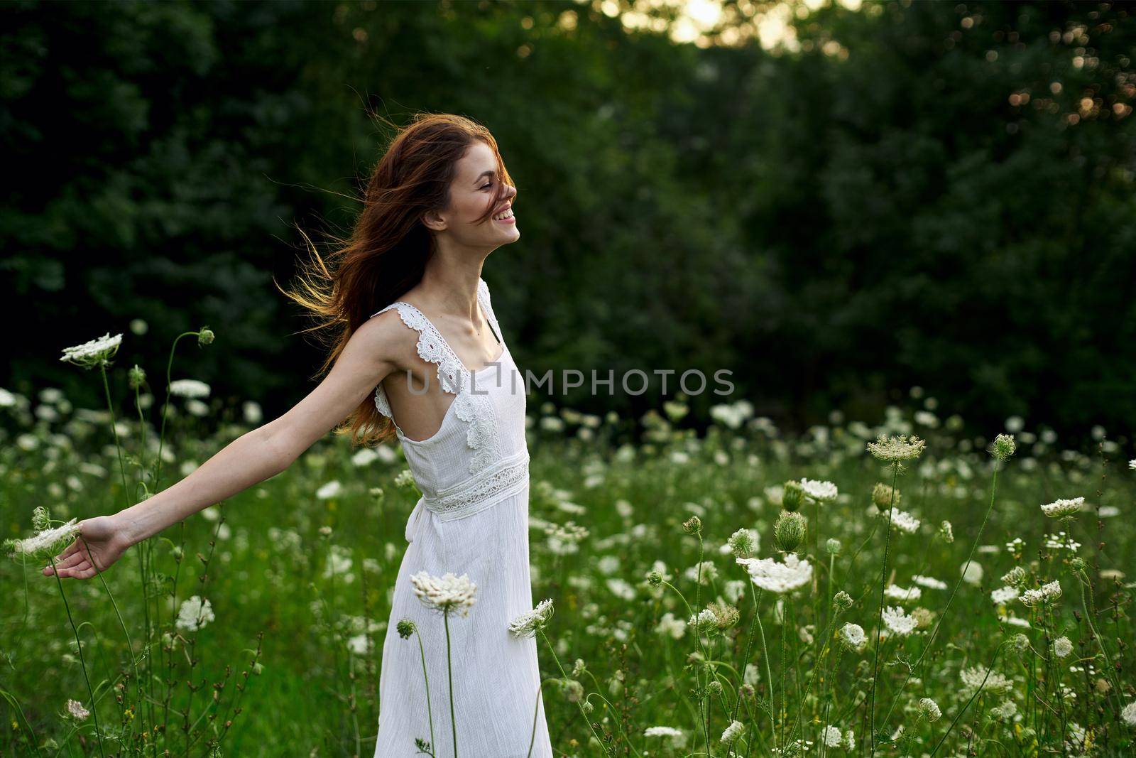 pretty woman in white dress field flowers freedom nature by Vichizh
