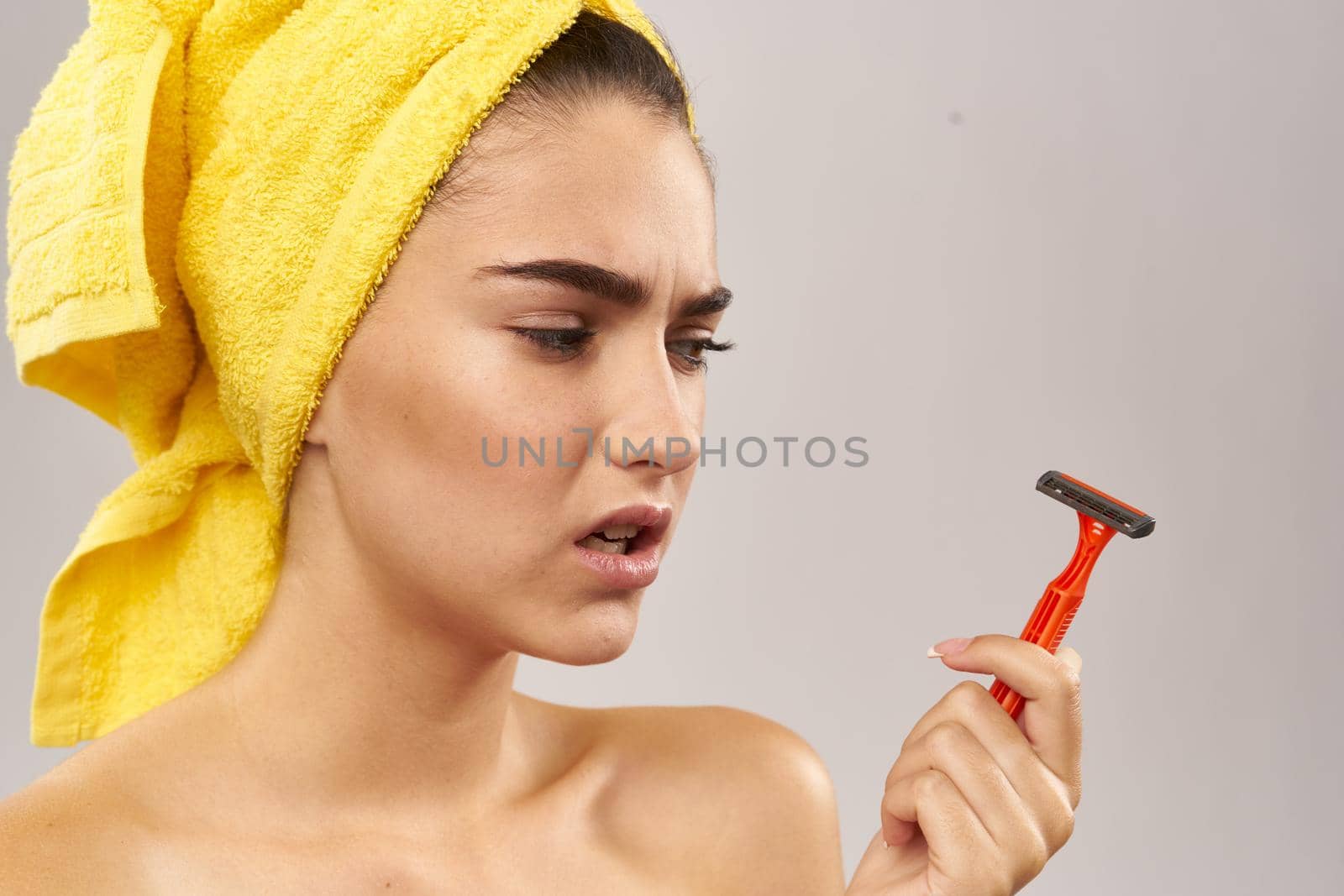cheerful woman razor in hand skin care hygiene isolated background by Vichizh
