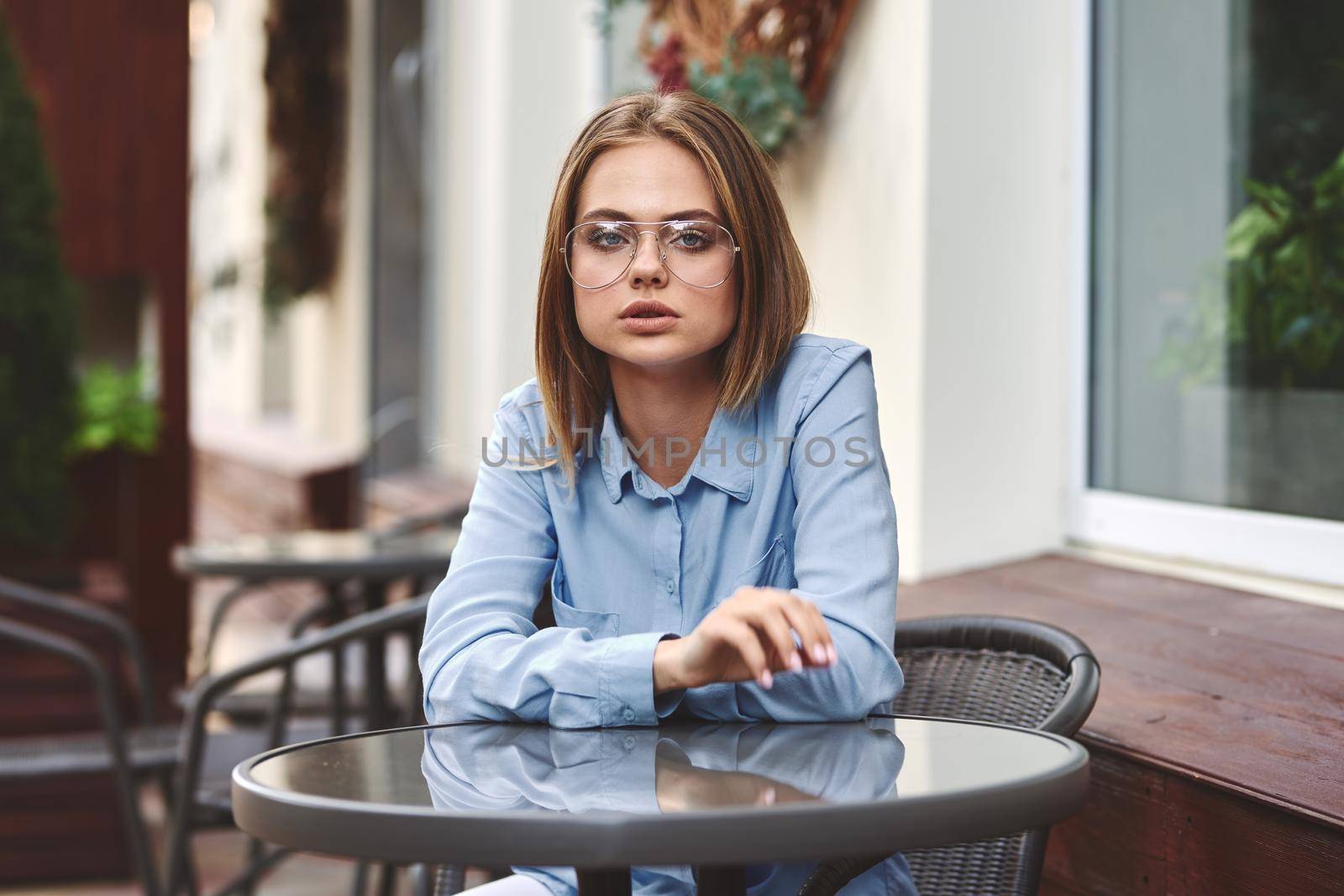 business woman outdoors in a cafe leisure official professional. High quality photo
