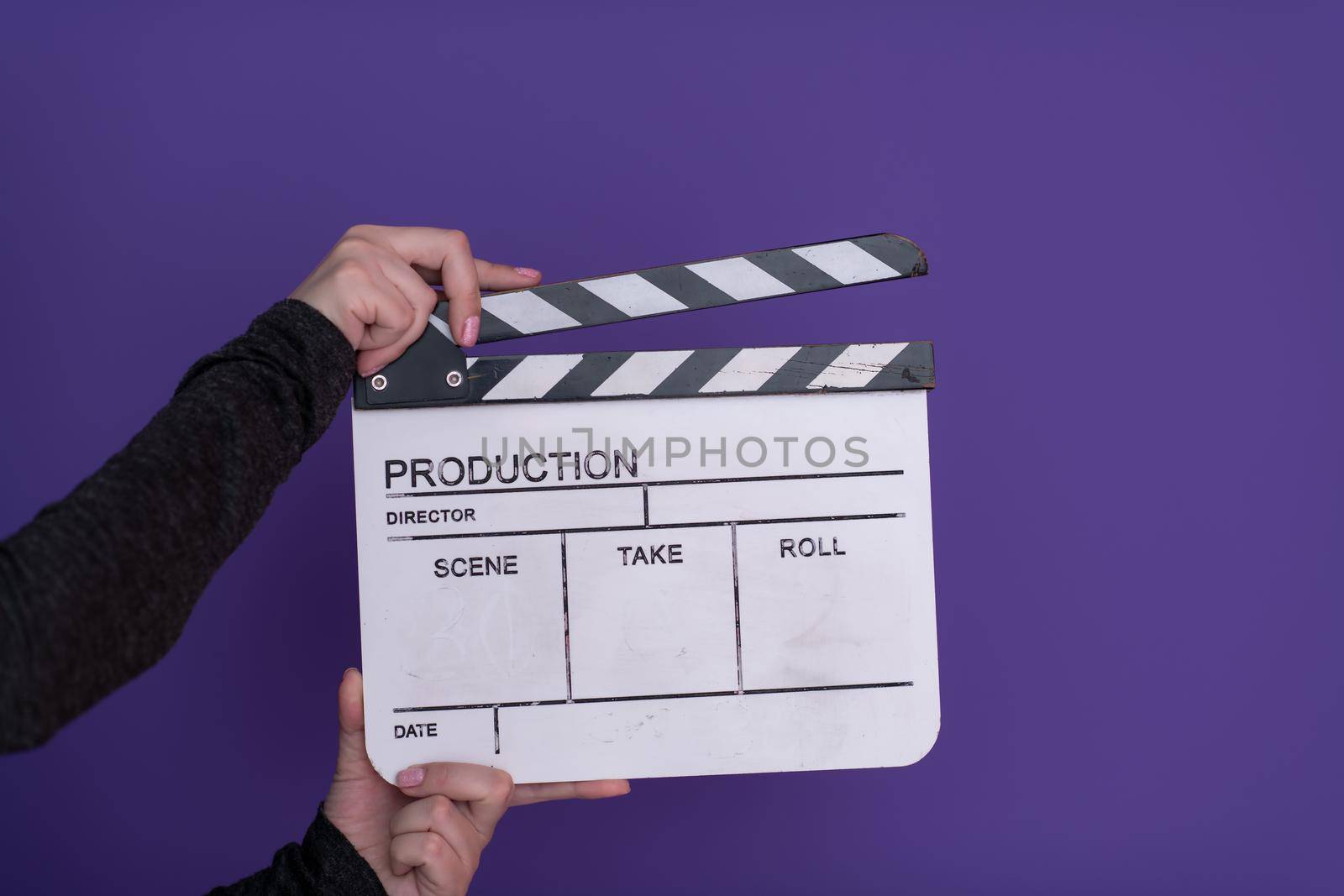 movie clapper on purple background by dotshock