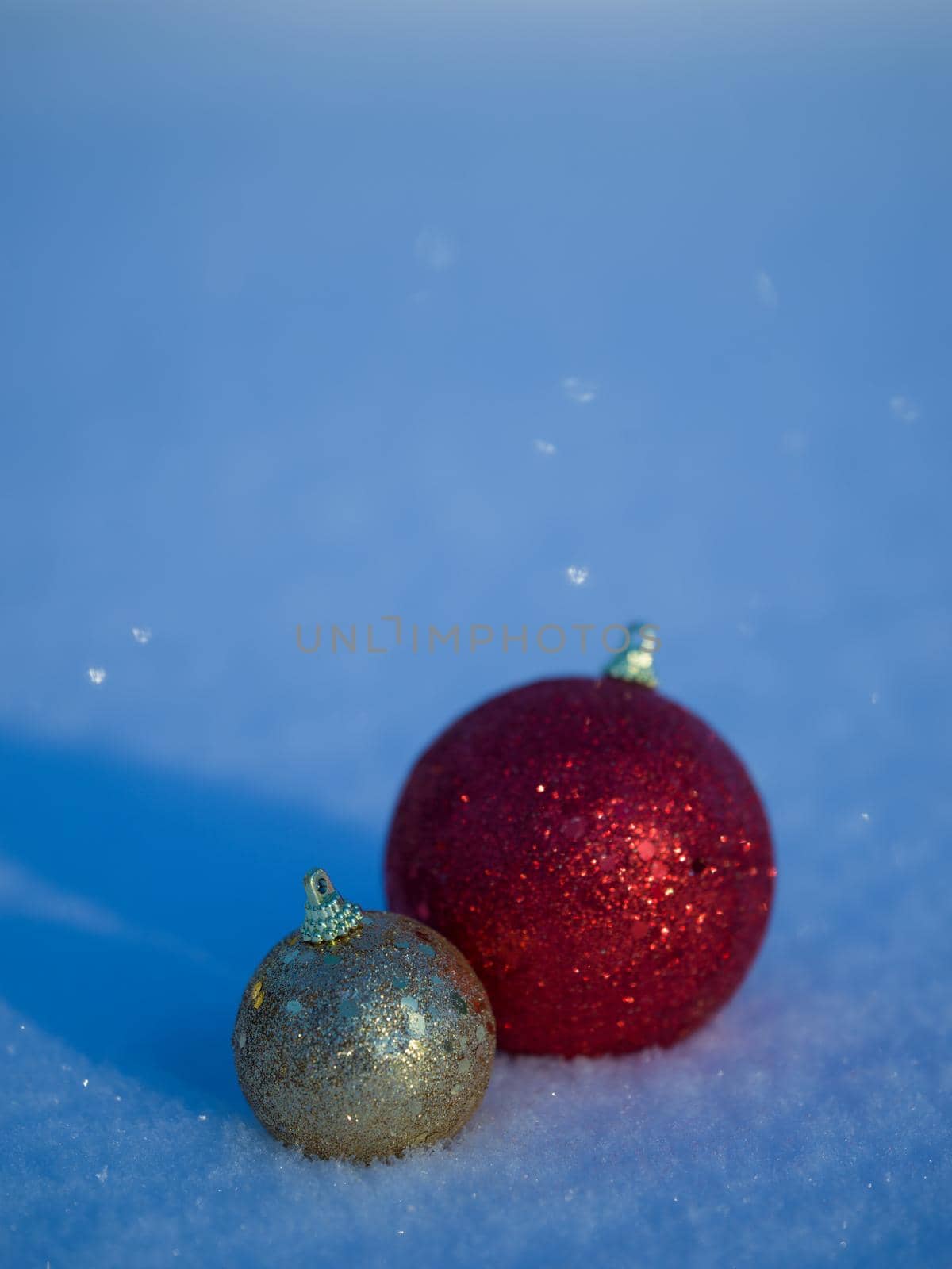 christmas balls decoration in snow by dotshock