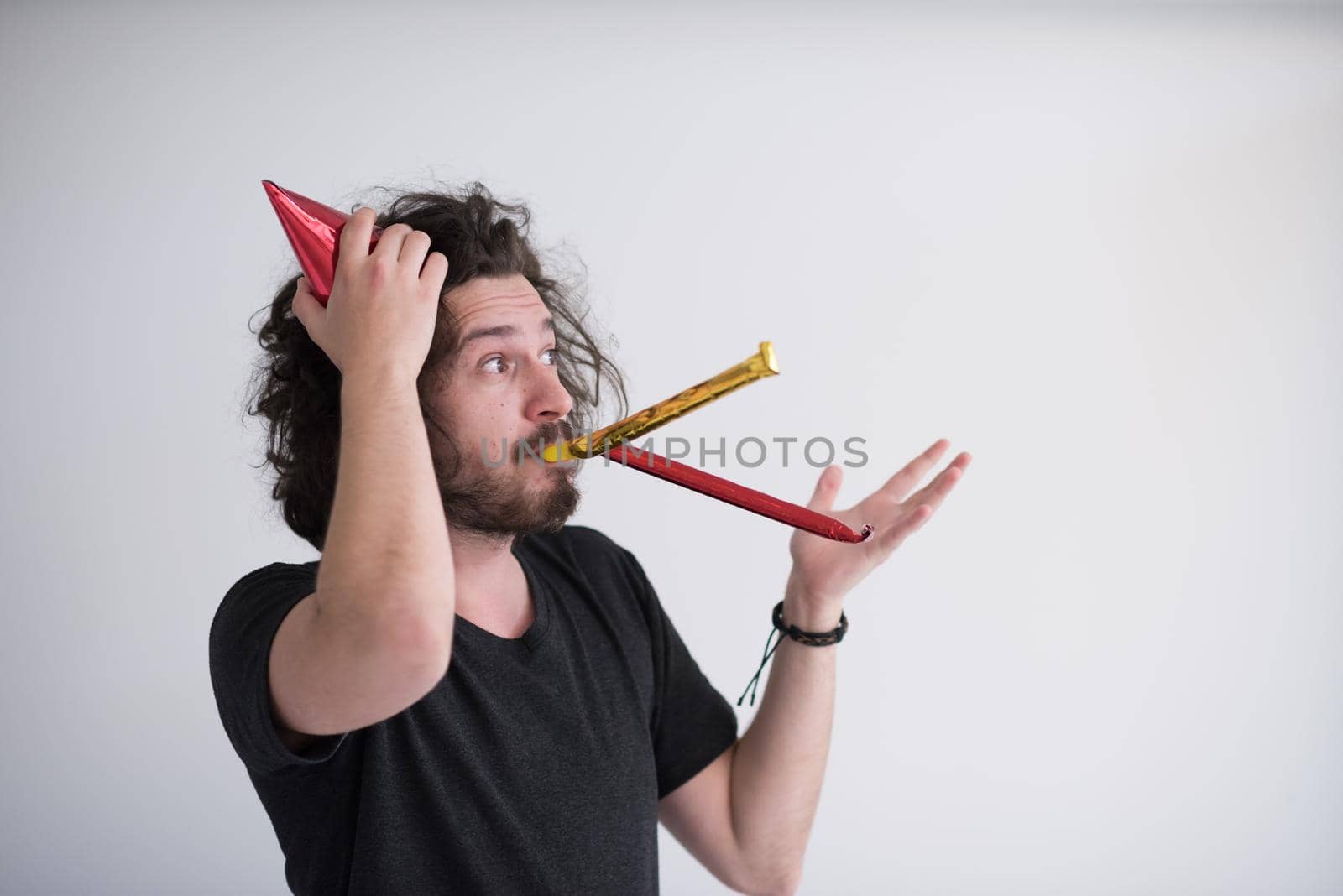 young man on party celebrating new year and dancing