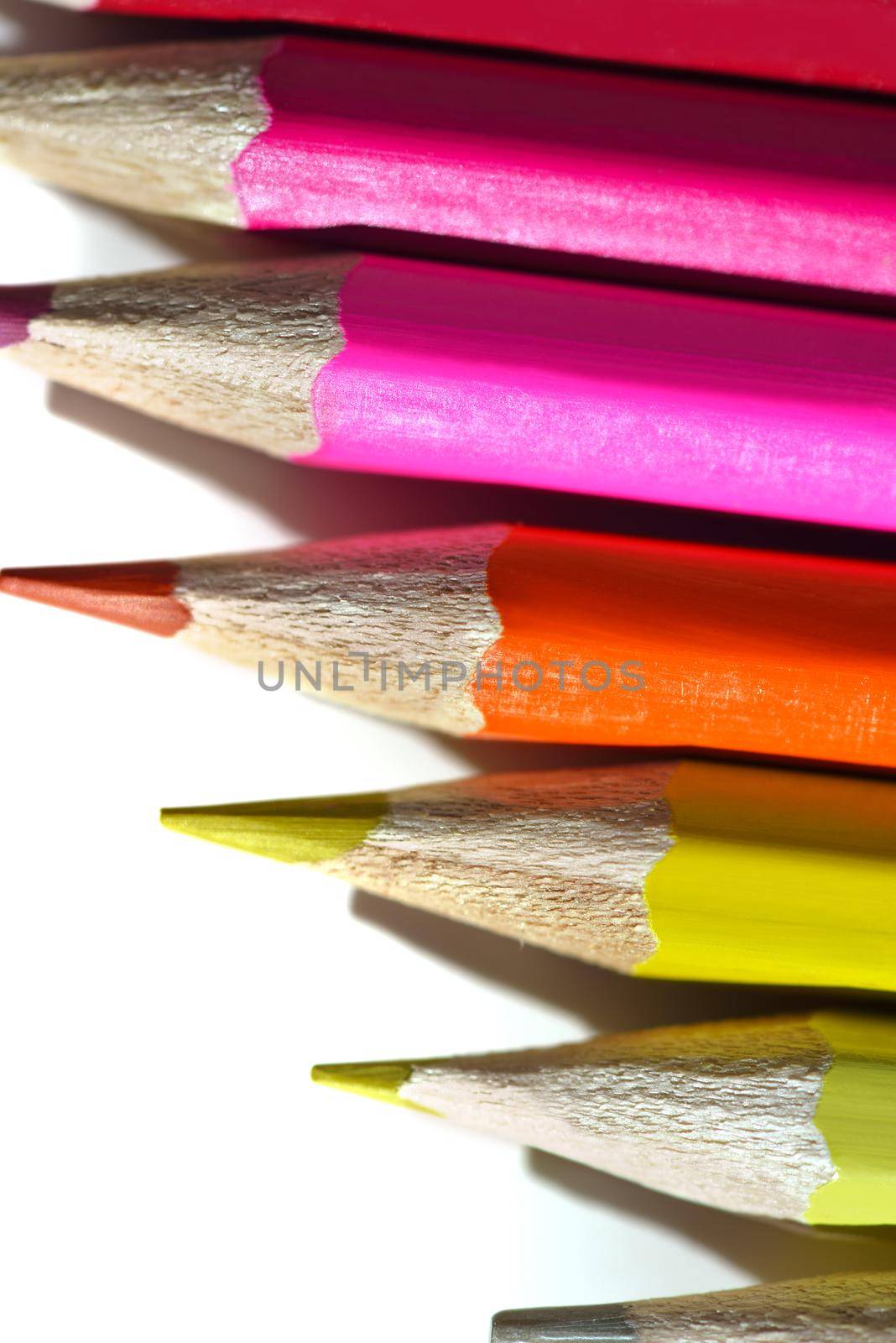 children education concept with colorful wooden pen isolated on white background