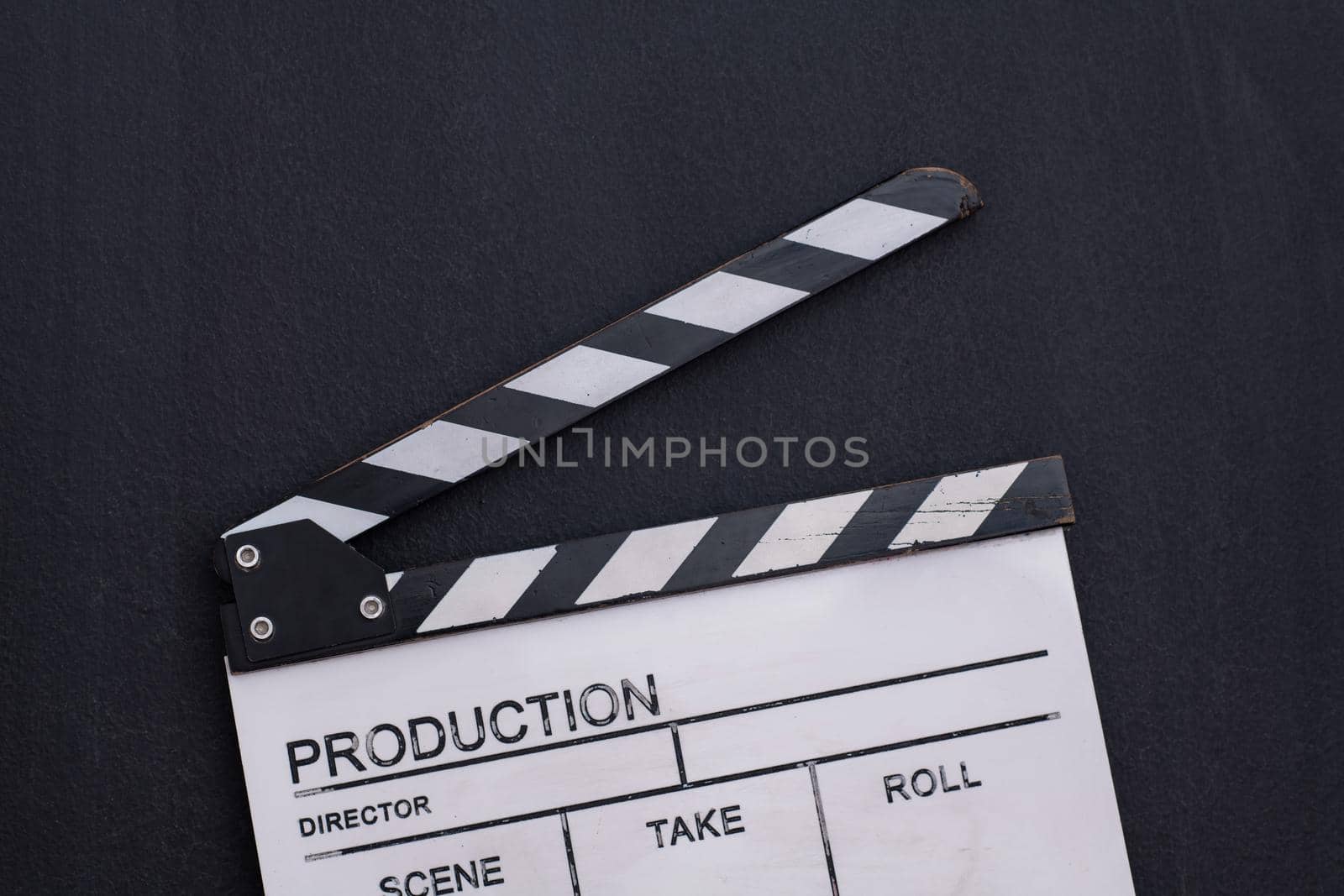 video production movie clapper cinema action and cut concept on balck chalkboard background