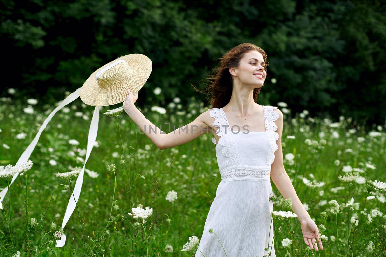 Woman in white dress hat nature field flowers by Vichizh