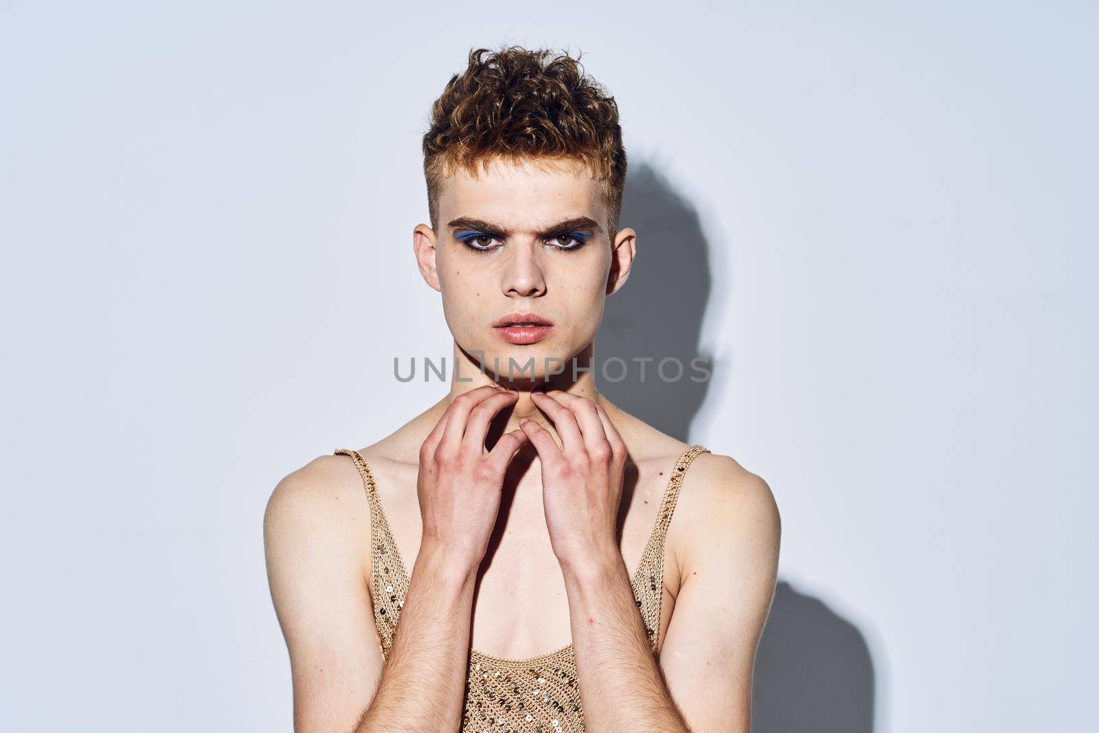 man with female makeup transgender posing fashion lgbt community. High quality photo
