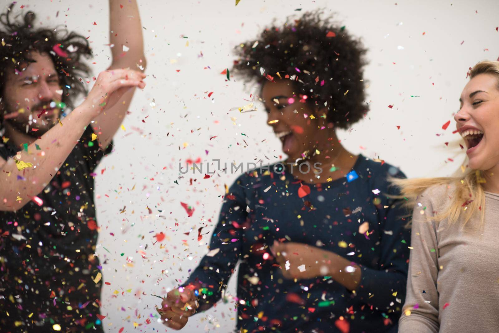 confetti party happy young people group celebrating new year eve while dancing and have fun at home