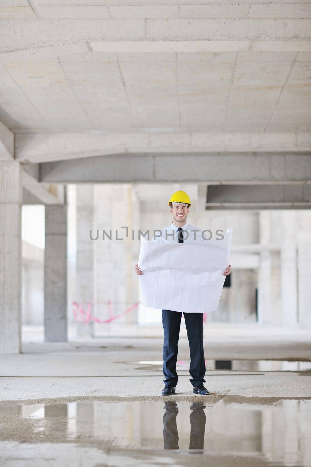 architect on construction site by dotshock