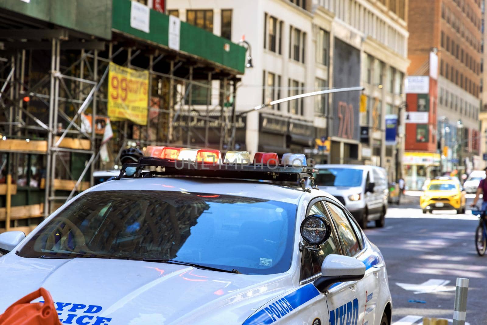 18 June 2021 New York, USA: A police car with light flashes on the roof rush an emergency call in New York City