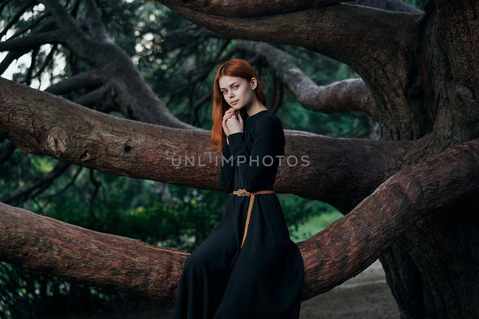 woman in black dress nature walk garden trees fresh air by Vichizh