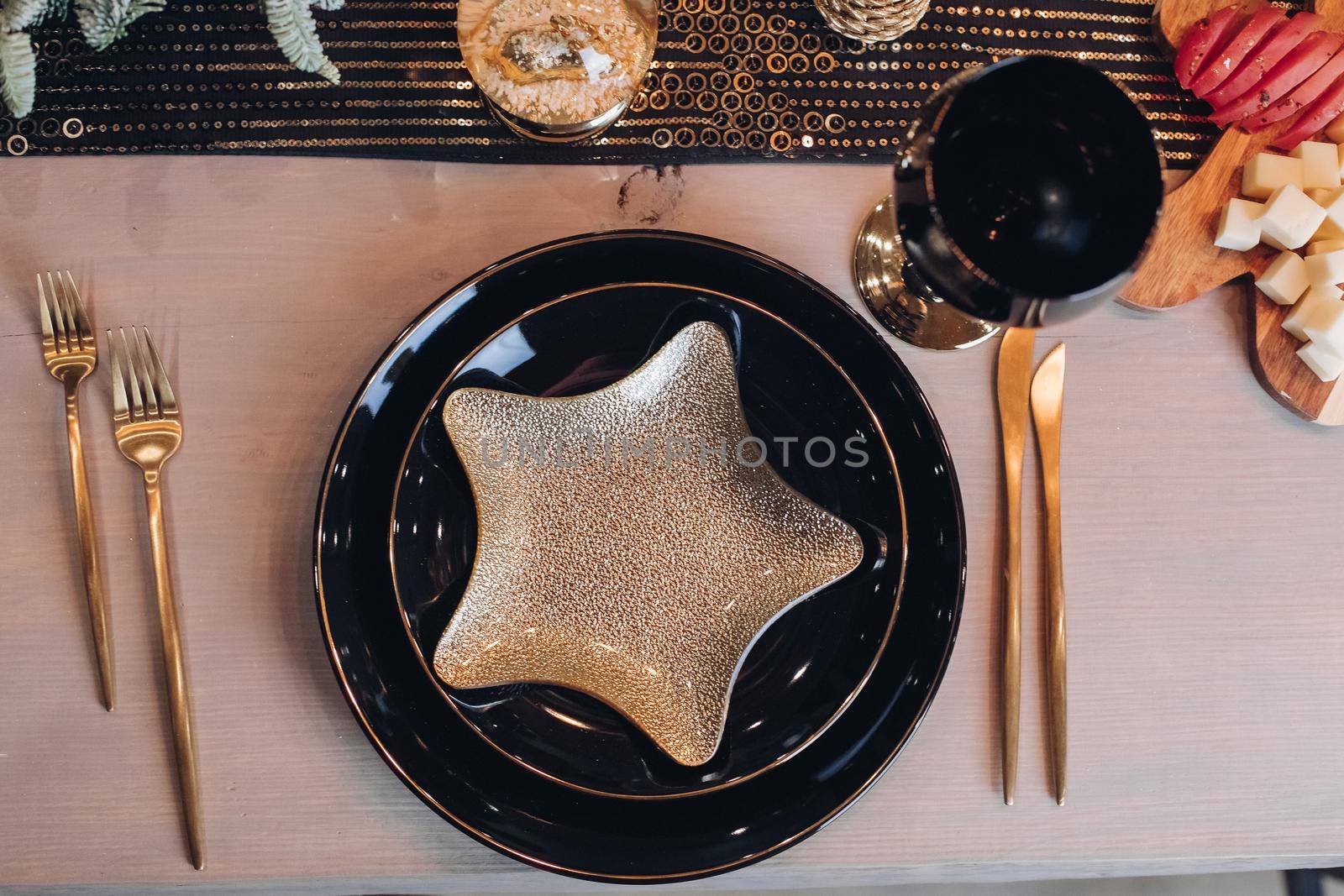 Top view of festive table setting for New Year celebration at home. New Year eve concept