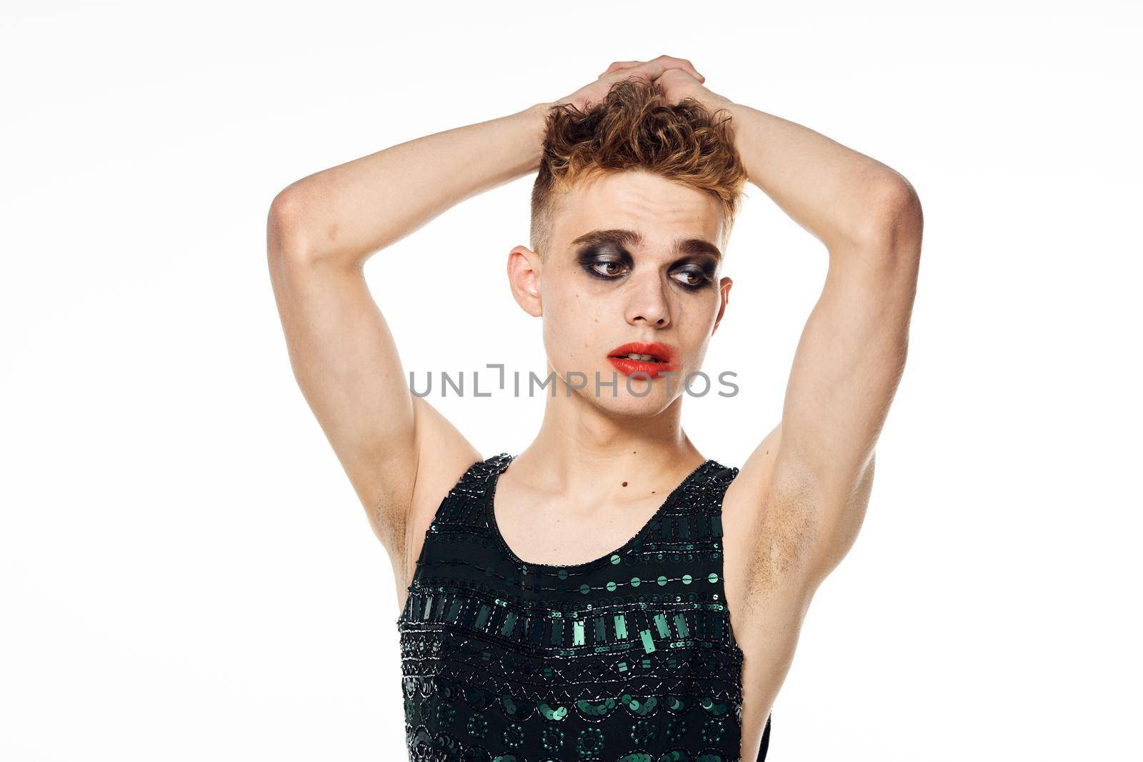 male transgender female makeup fashion posing studio. High quality photo