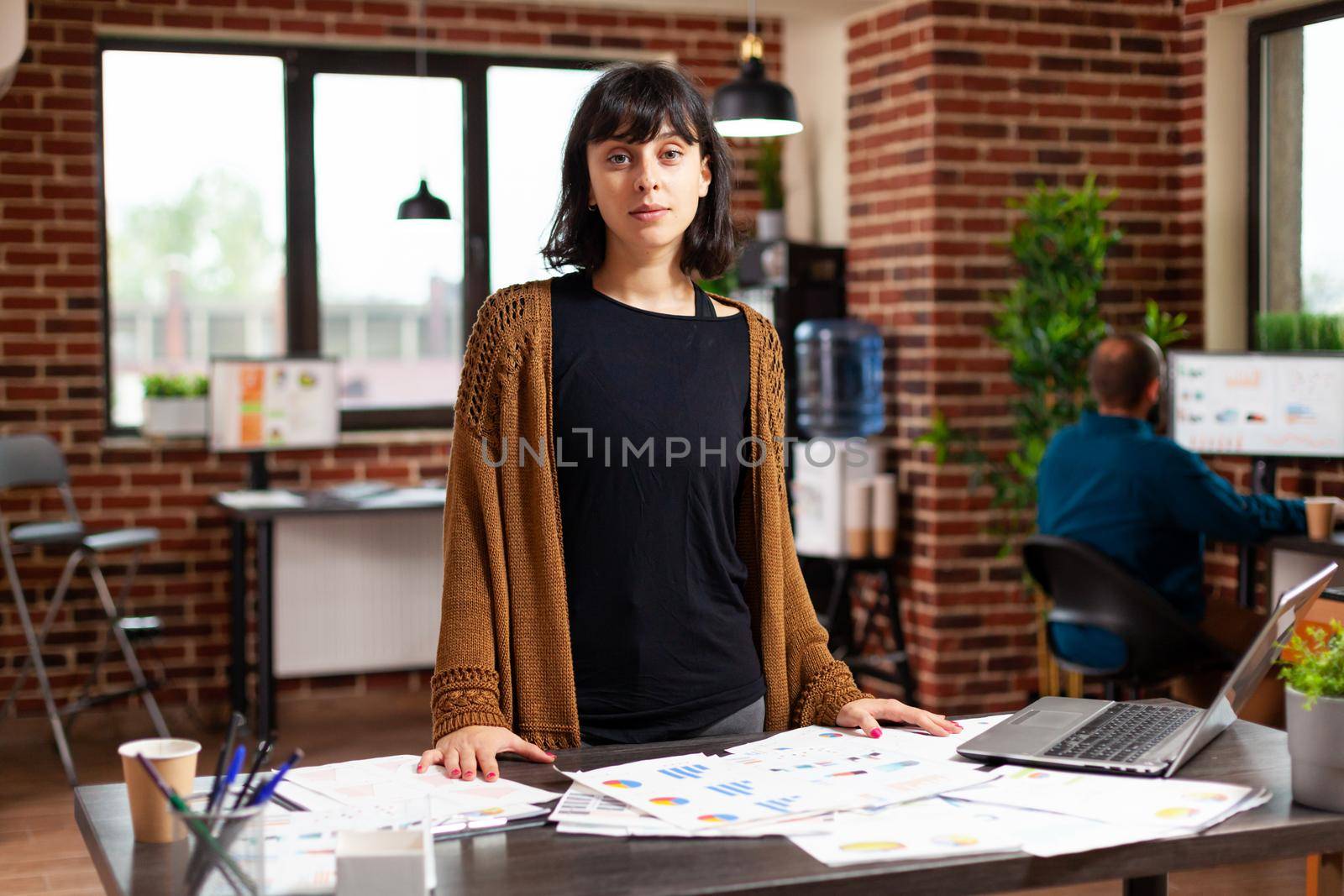 Portrait of businesswoman preparing business meeting working at marketing strategy by DCStudio