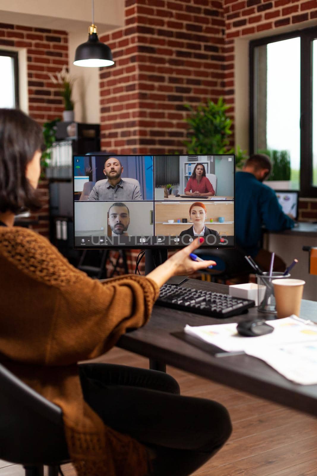 Executive manager discussing business strategy with remote collegues during online videocall meeting conference explaining company presentation Teleconference call on computer screen