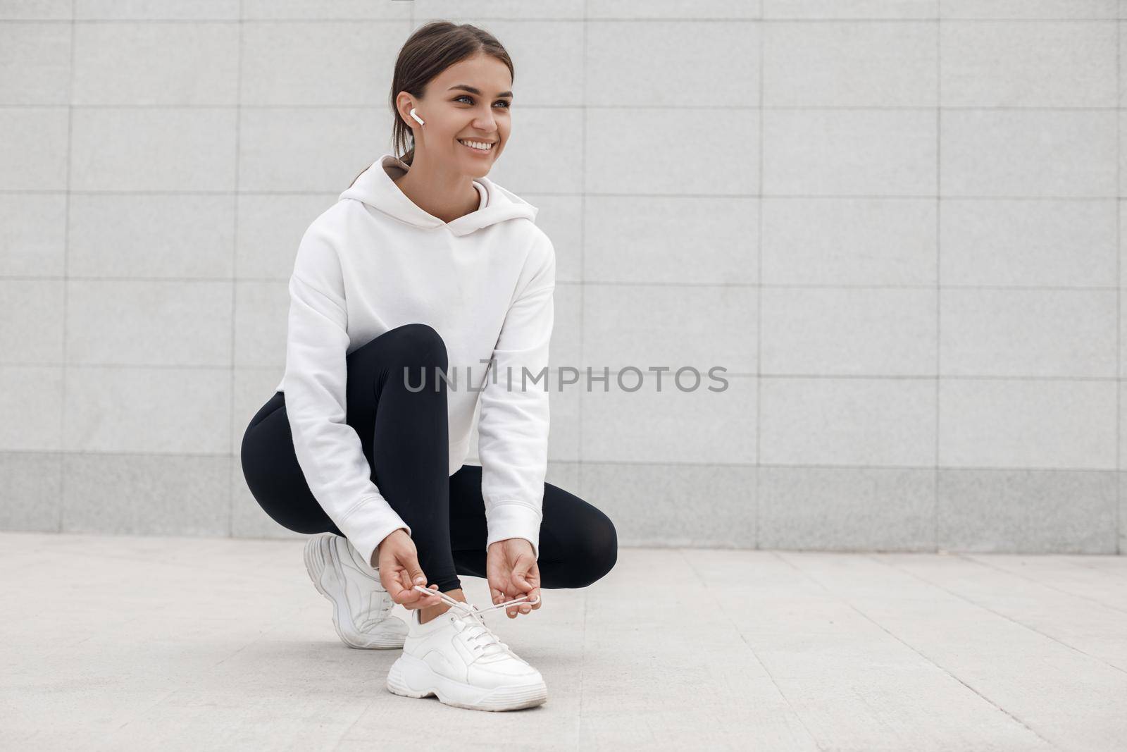 Young woman doing fitness. High quality photo