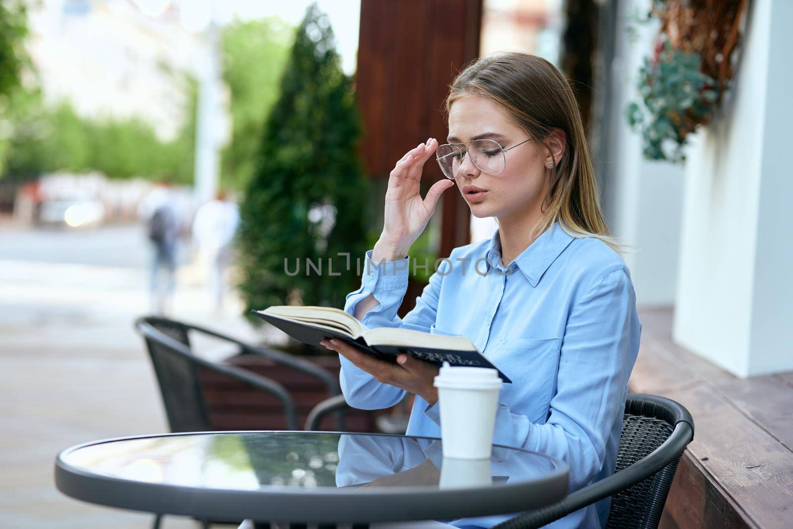 business woman outdoors in a cafe leisure official professional. High quality photo