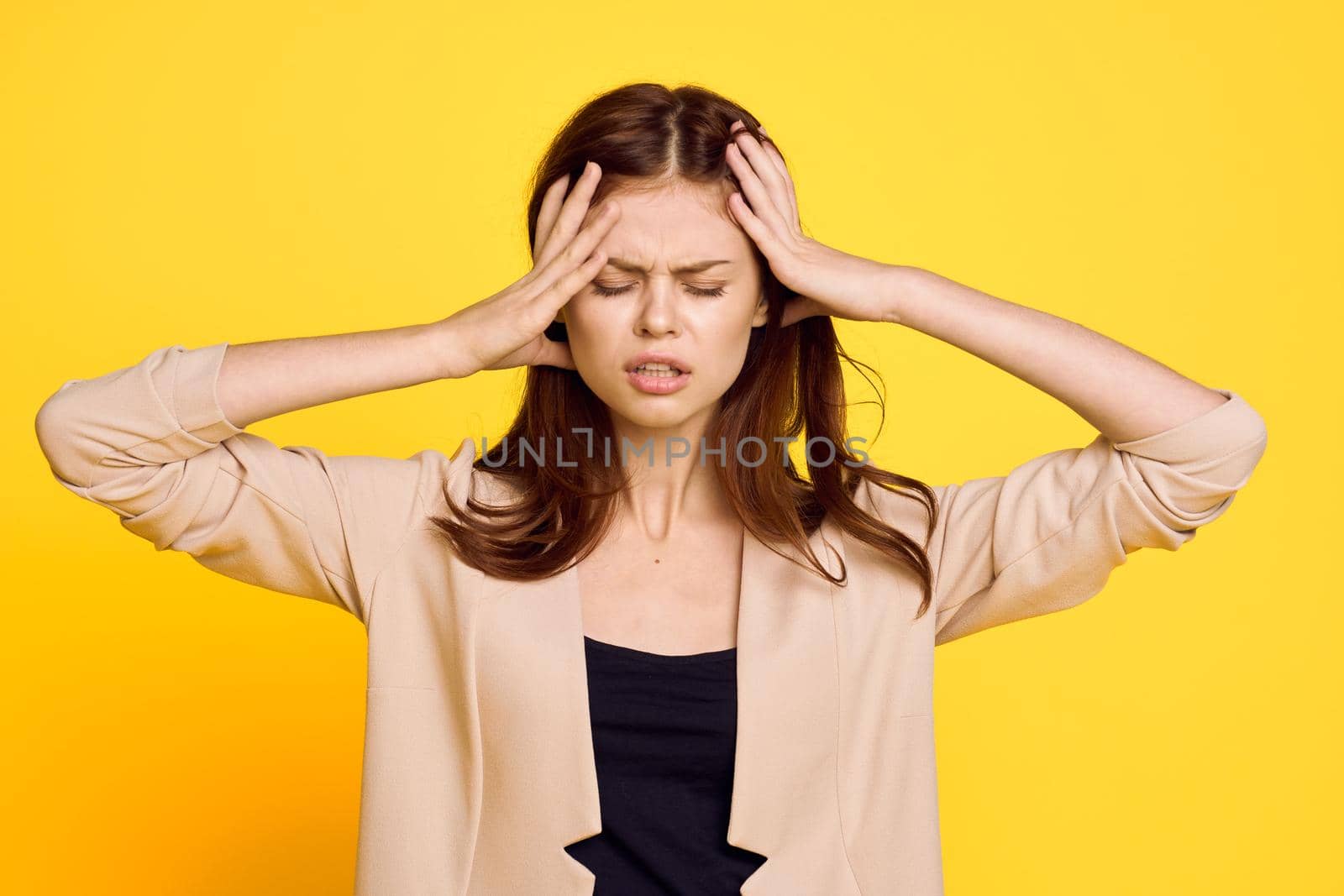 pretty woman posing fashion emotions yellow background. High quality photo