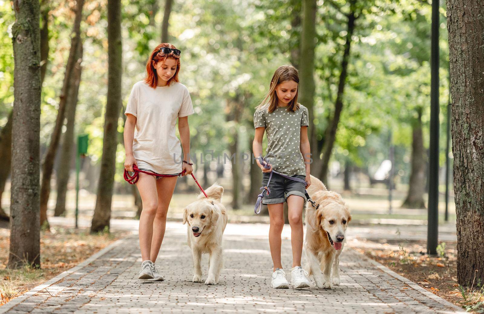 Girls with golden retriever dog by tan4ikk1