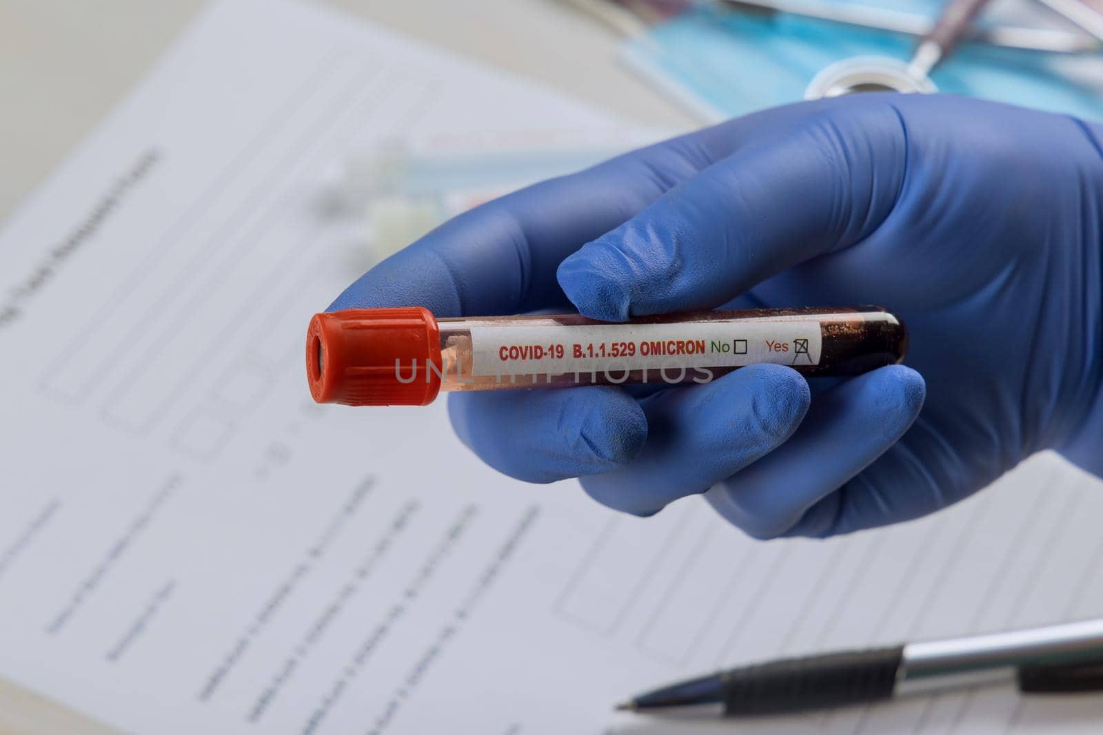 Medical professionals in the laboratory with blood samples for new version Omicron Covid-19 Coronavirus by ungvar