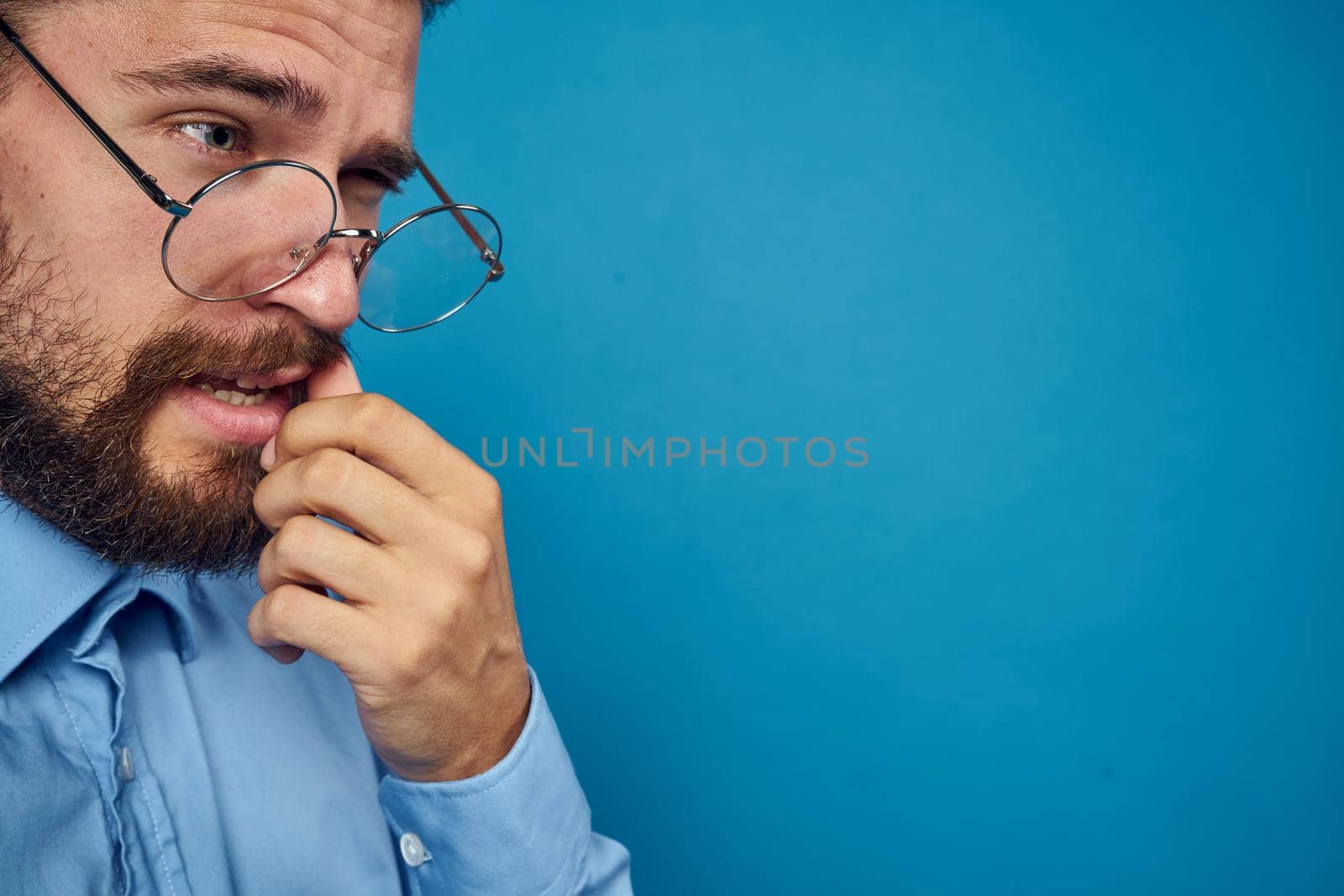 business man with glasses emotions blue background by Vichizh