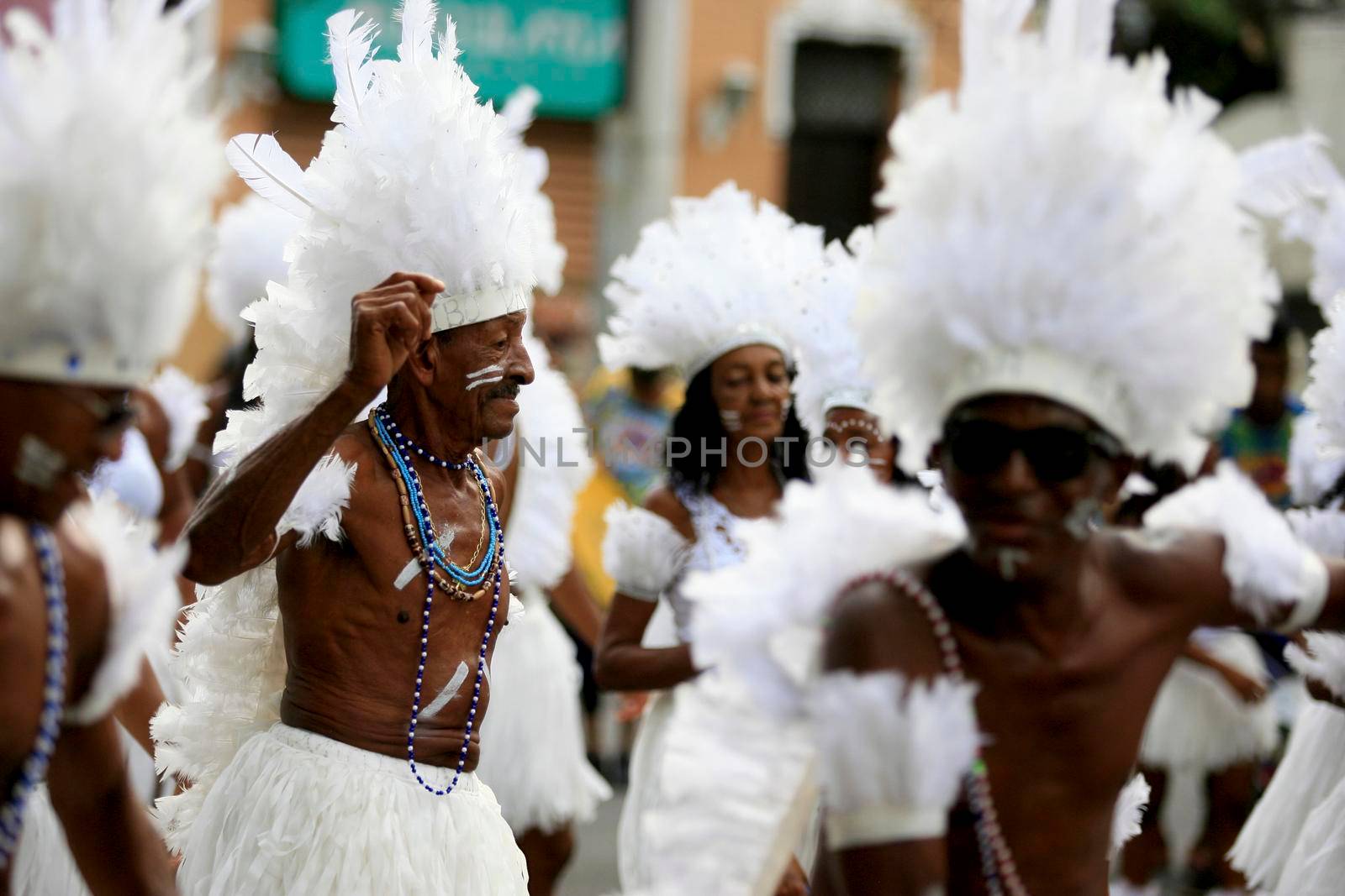 salvador, bahia, brazil - february 24, 2017: Members of the Commanches carnival block are seen during a parade on the Salvador city's carnival circuit.