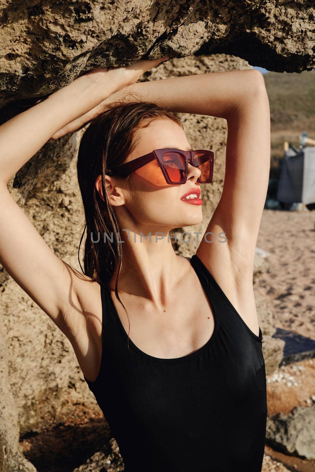 pretty woman in black swimsuit sunglasses posing sun by Vichizh