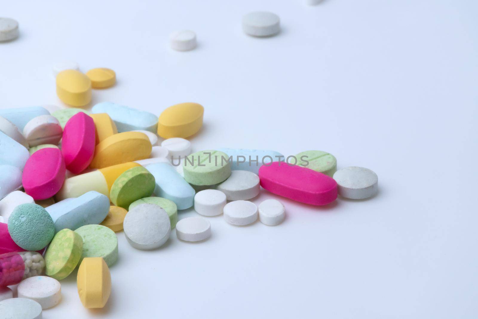 Medical drugs pills isolated on white background. by thanumporn