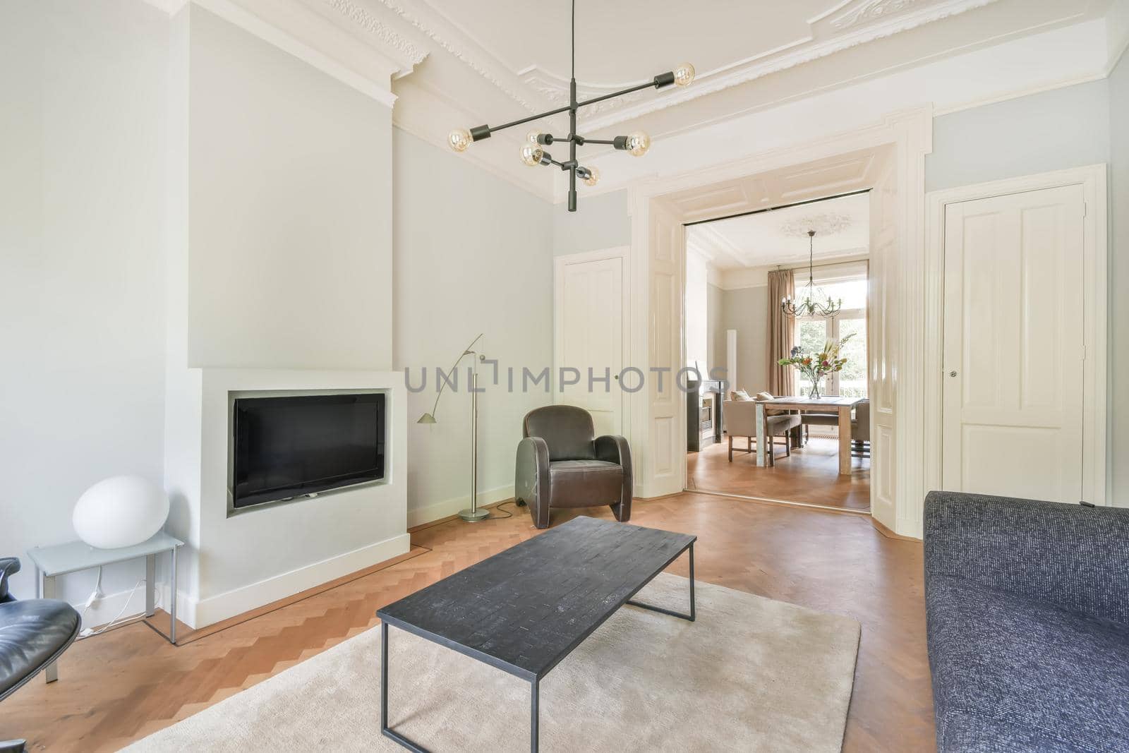 Cozy living room with large sofa and TV