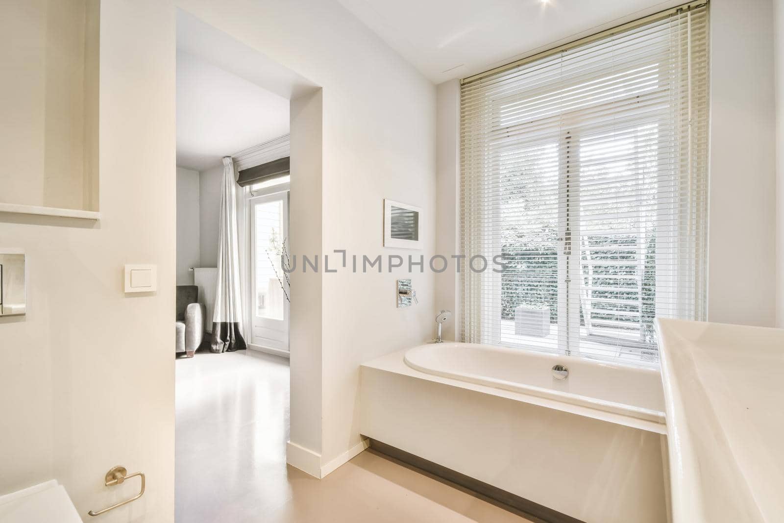 Beautiful bathroom with a large bathtub near the window