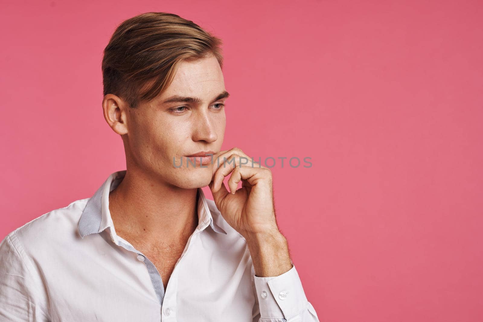 businessmen posing white shirt fashion self confidence pink background. High quality photo