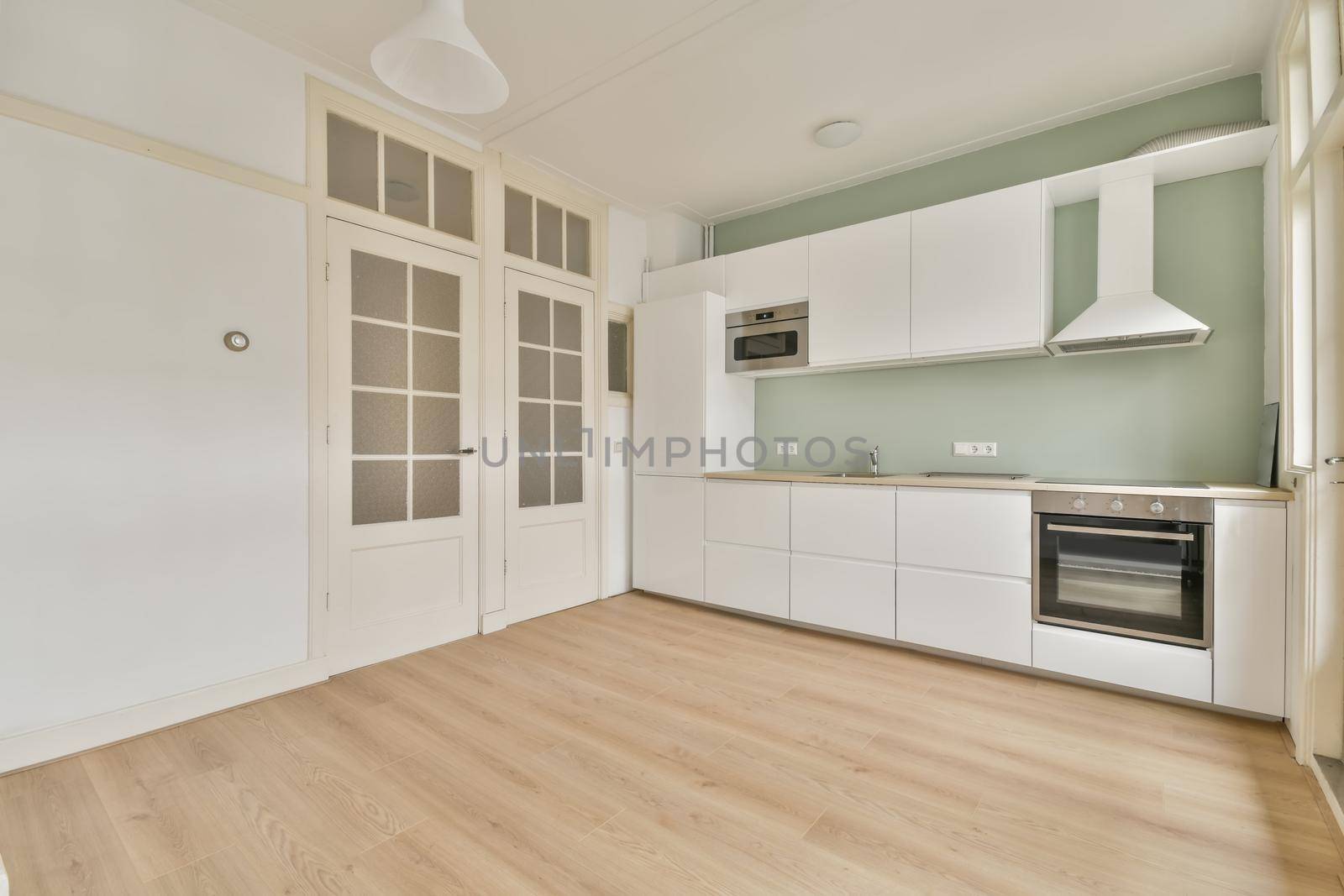 Interior of empty home kitchen with contemporary appliances