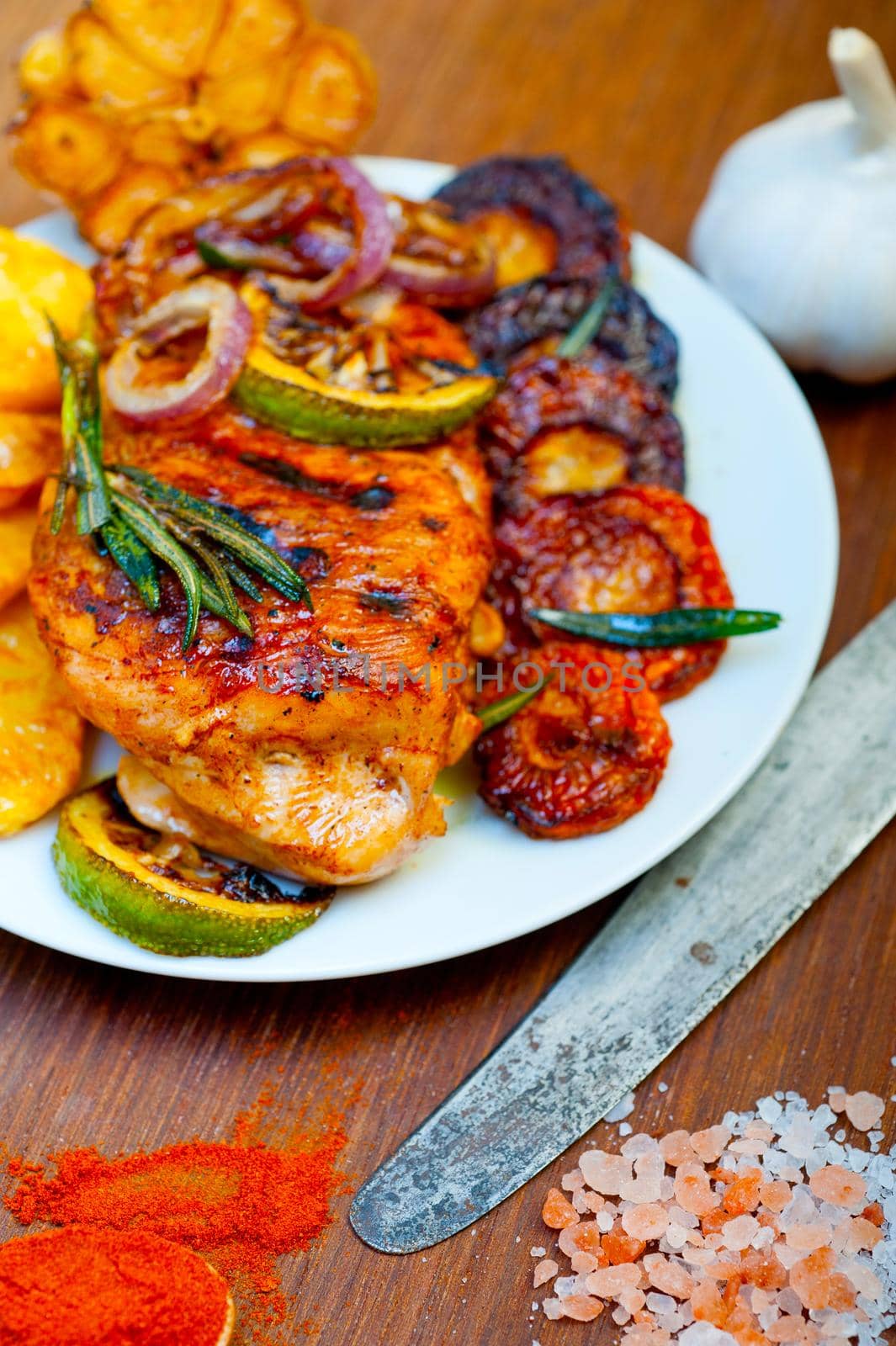roasted grilled BBQ chicken breast with herbs and spices  by keko64