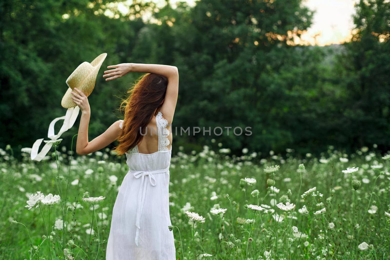pretty woman in a field in nature white dress fresh air by Vichizh
