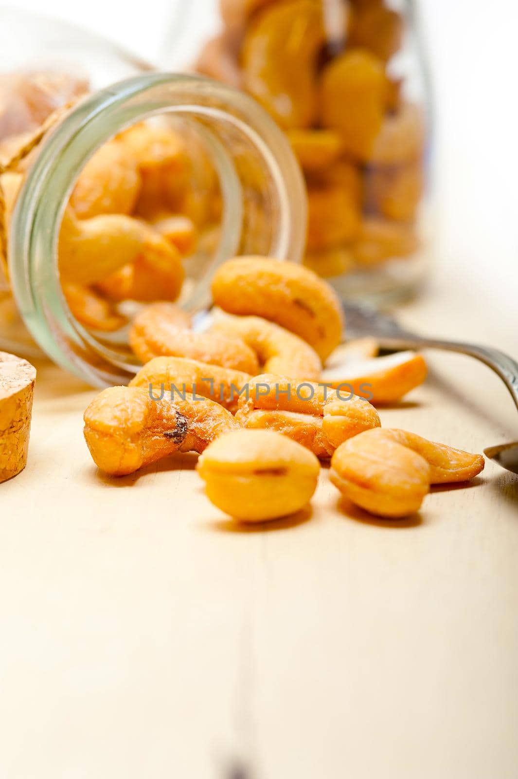 cashew nuts on a glass jar  by keko64