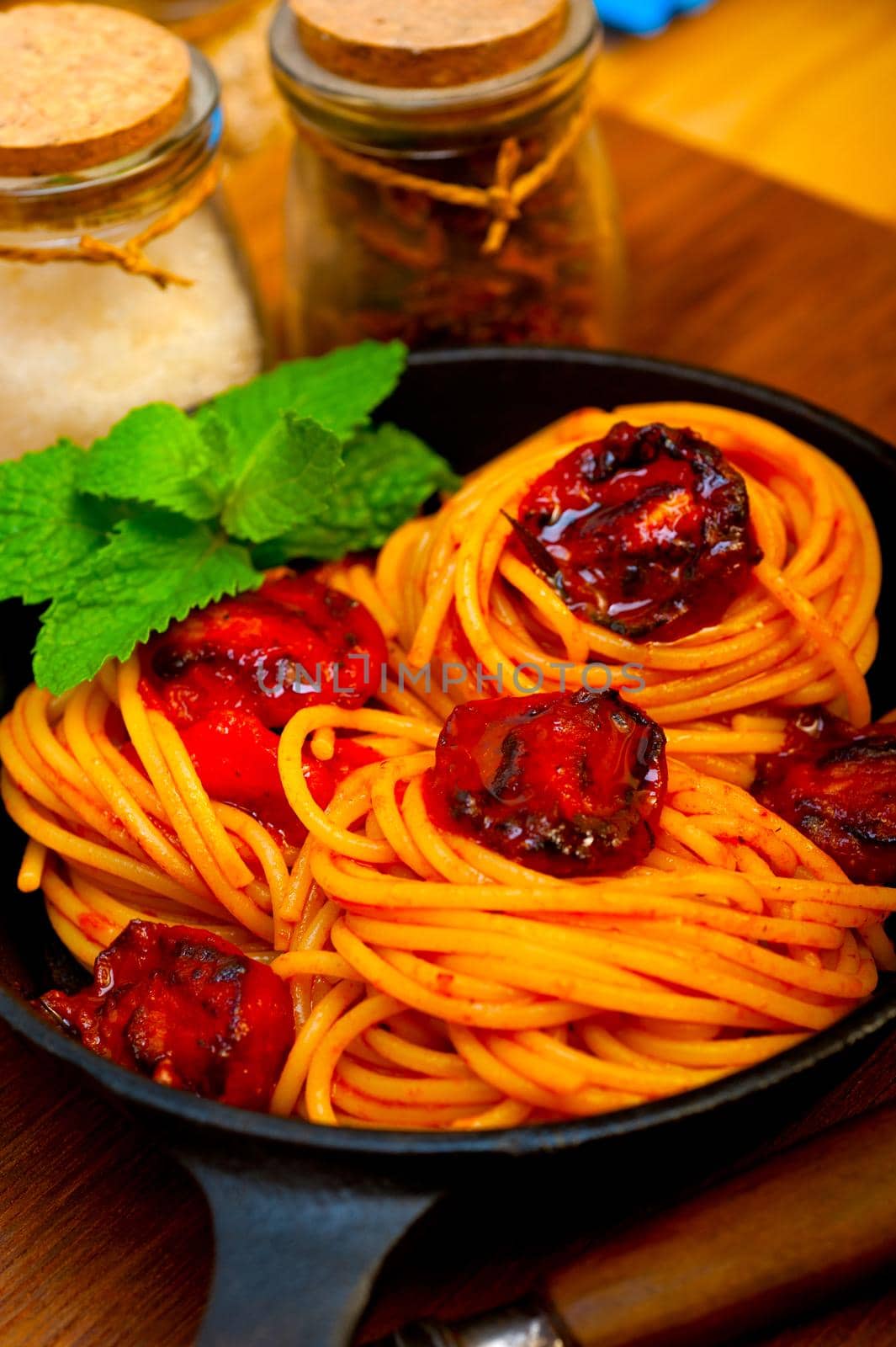 italian spaghetti pasta and tomato with mint leaves  by keko64