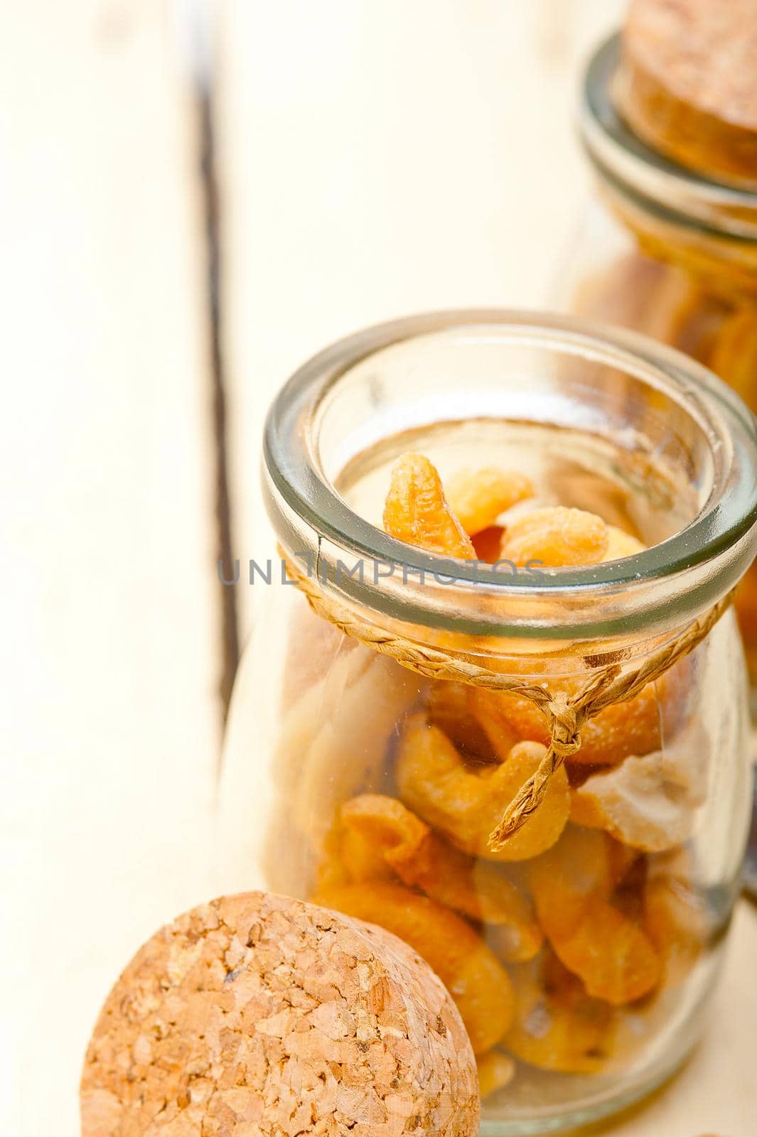 cashew nuts on a glass jar  by keko64