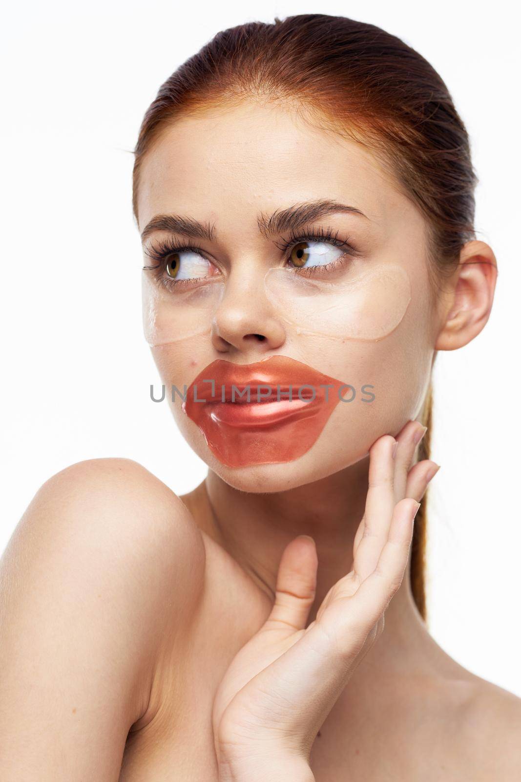 pretty woman naked shoulders lip mask skin care. High quality photo