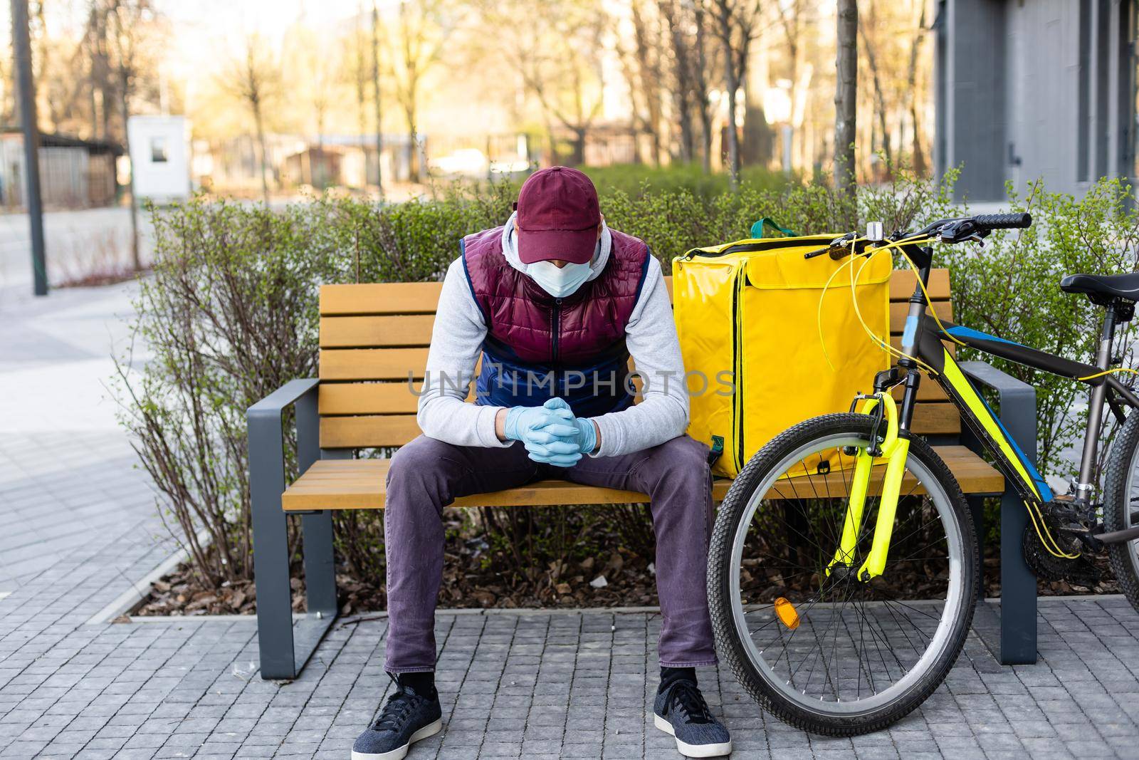 Young delivery man with yellow backpack takeaway concept.