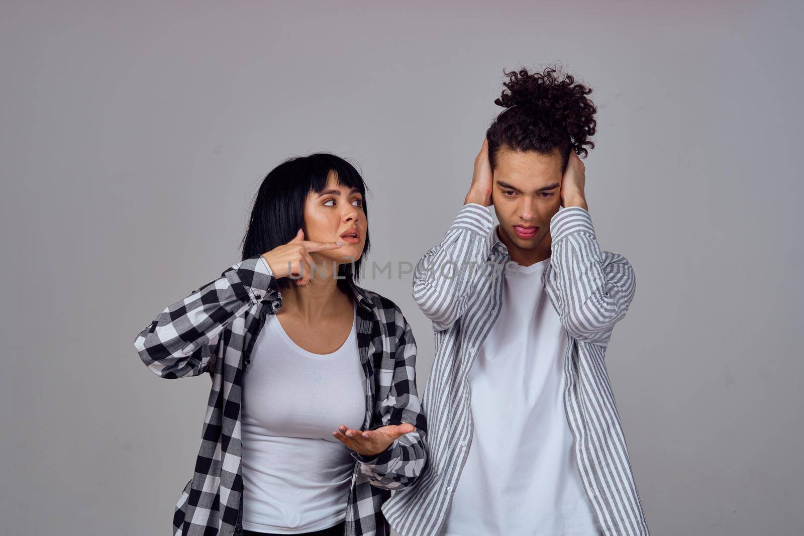 young couple modern clothes posing fun friendship. High quality photo