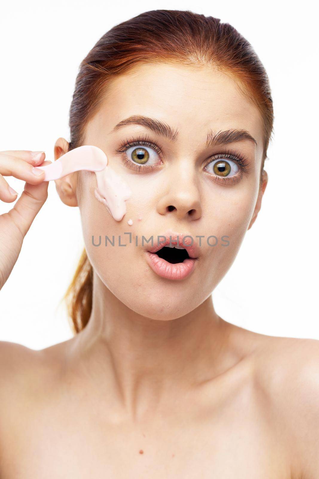 cheerful woman bare shoulders clean skin facials. High quality photo