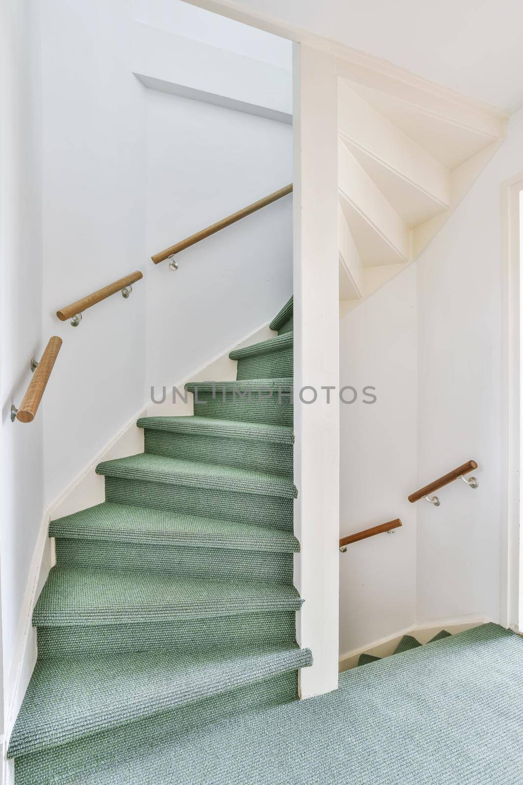 Gorgeous staircase with a gentle green floor