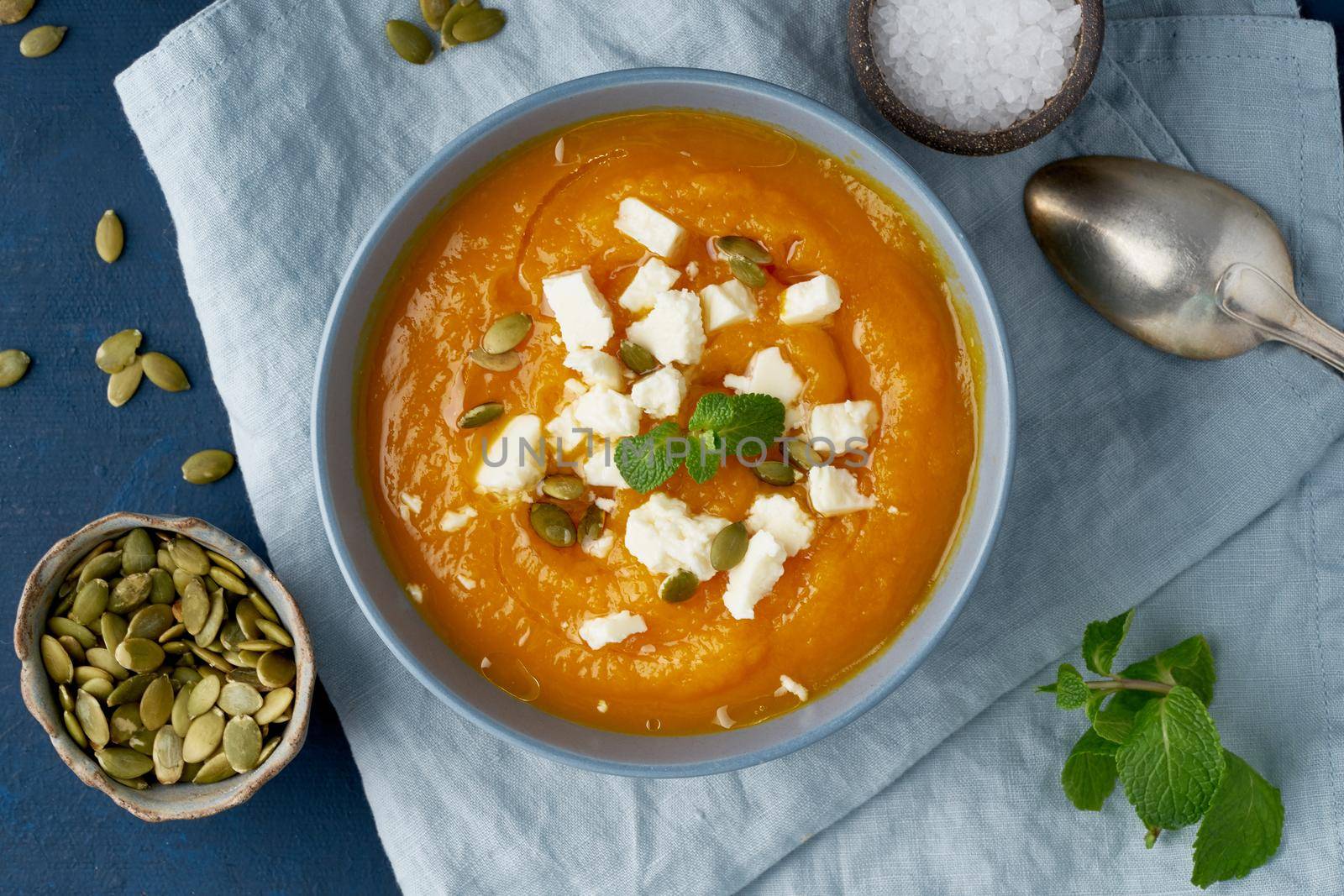 Pumpkin cream soup with sheep cheese, autumn homemade food by NataBene