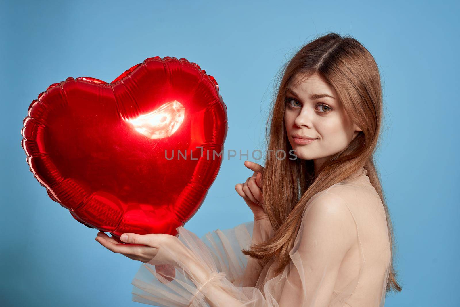 portrait of a woman heart balloon holiday Valentine's Day isolated background. High quality photo