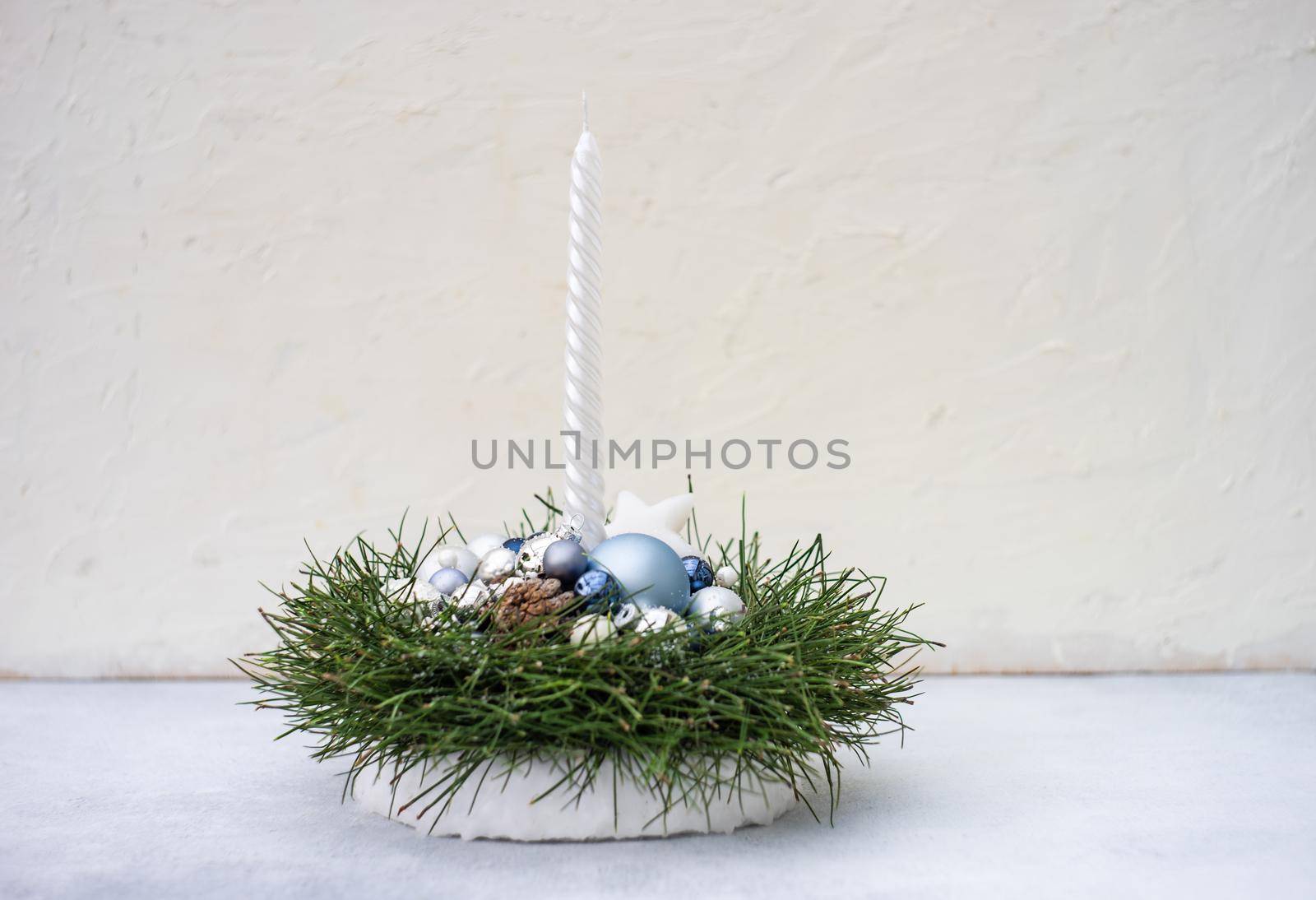 Christmas interior plant based composition with candles