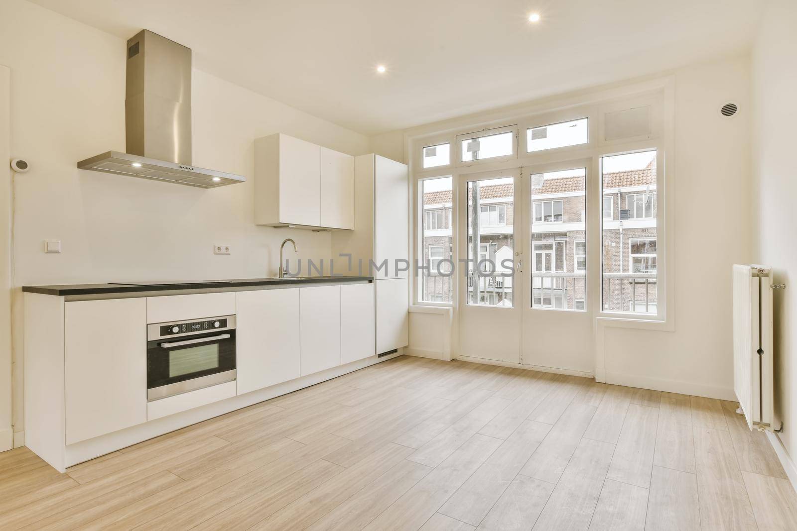 Stylish large kitchen area with large window