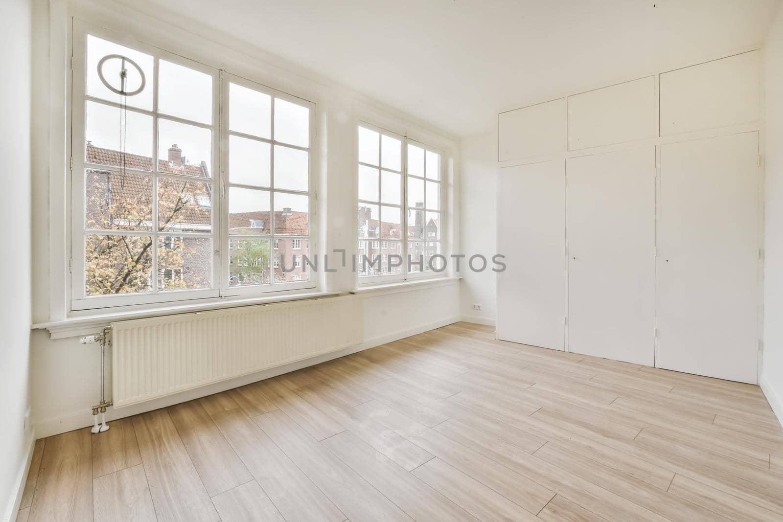 Spacious bright and pretty room with large windows